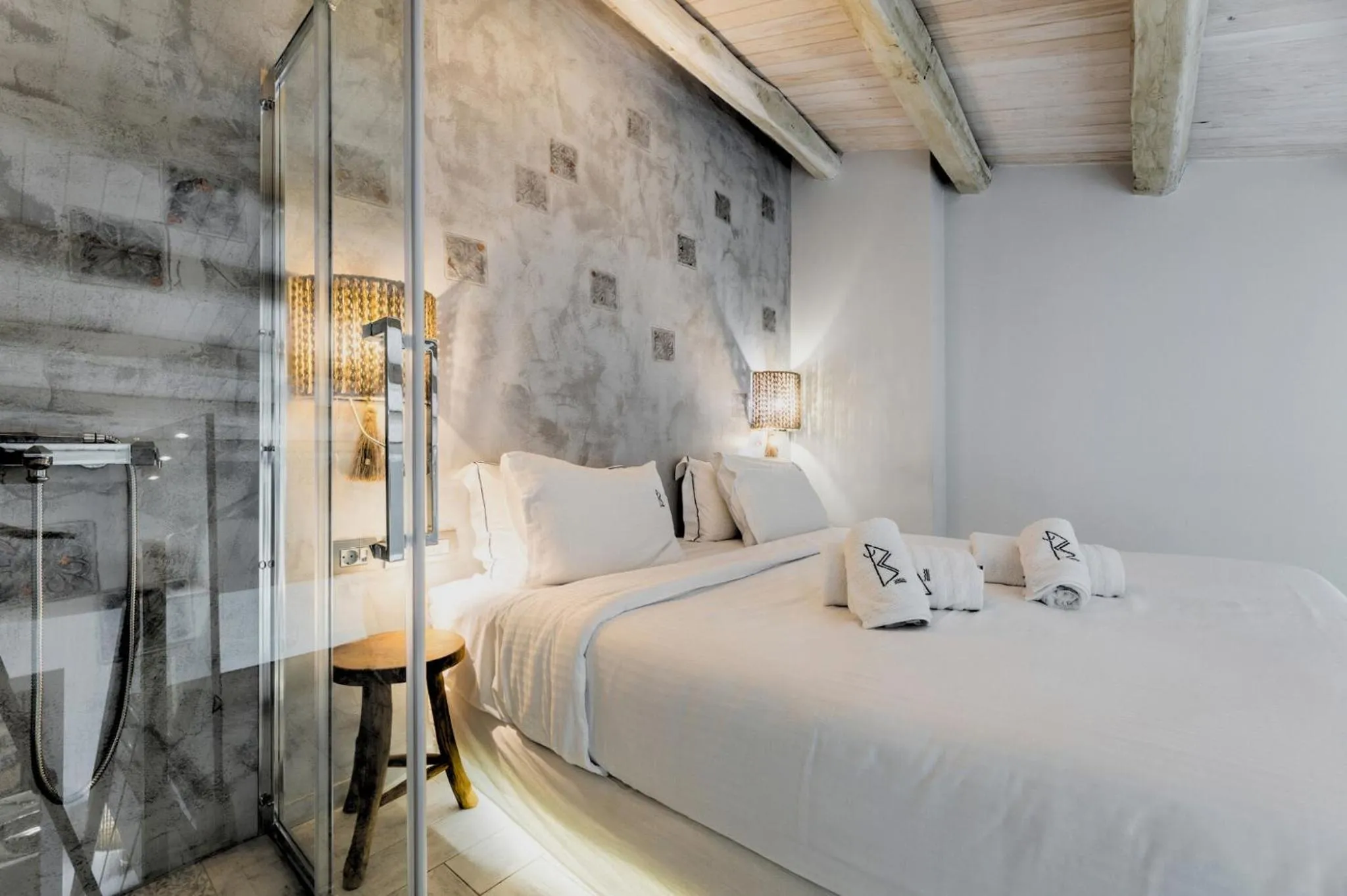 Bed in Blue Carpet Luxury Suites