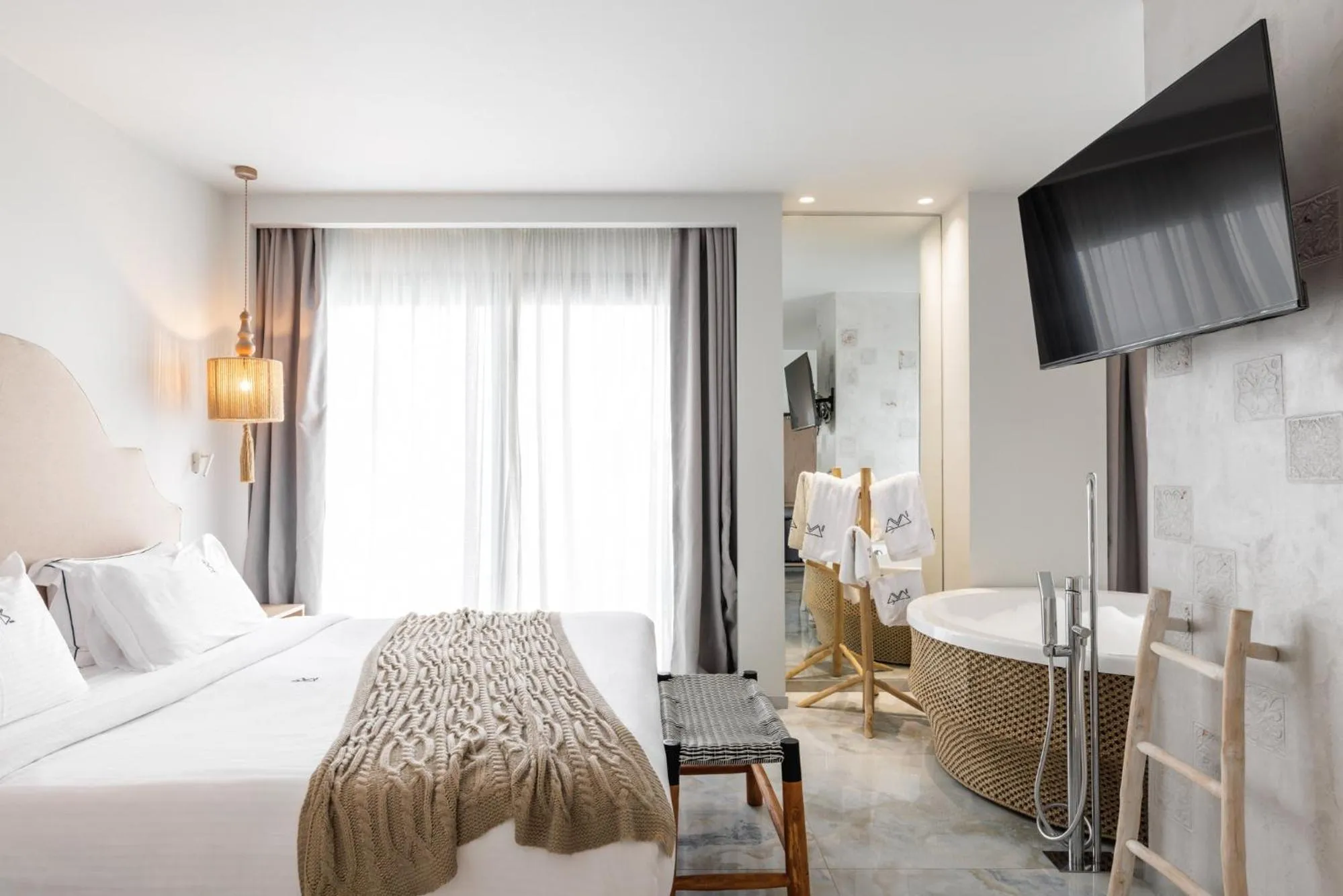 Bed in Blue Carpet Luxury Suites