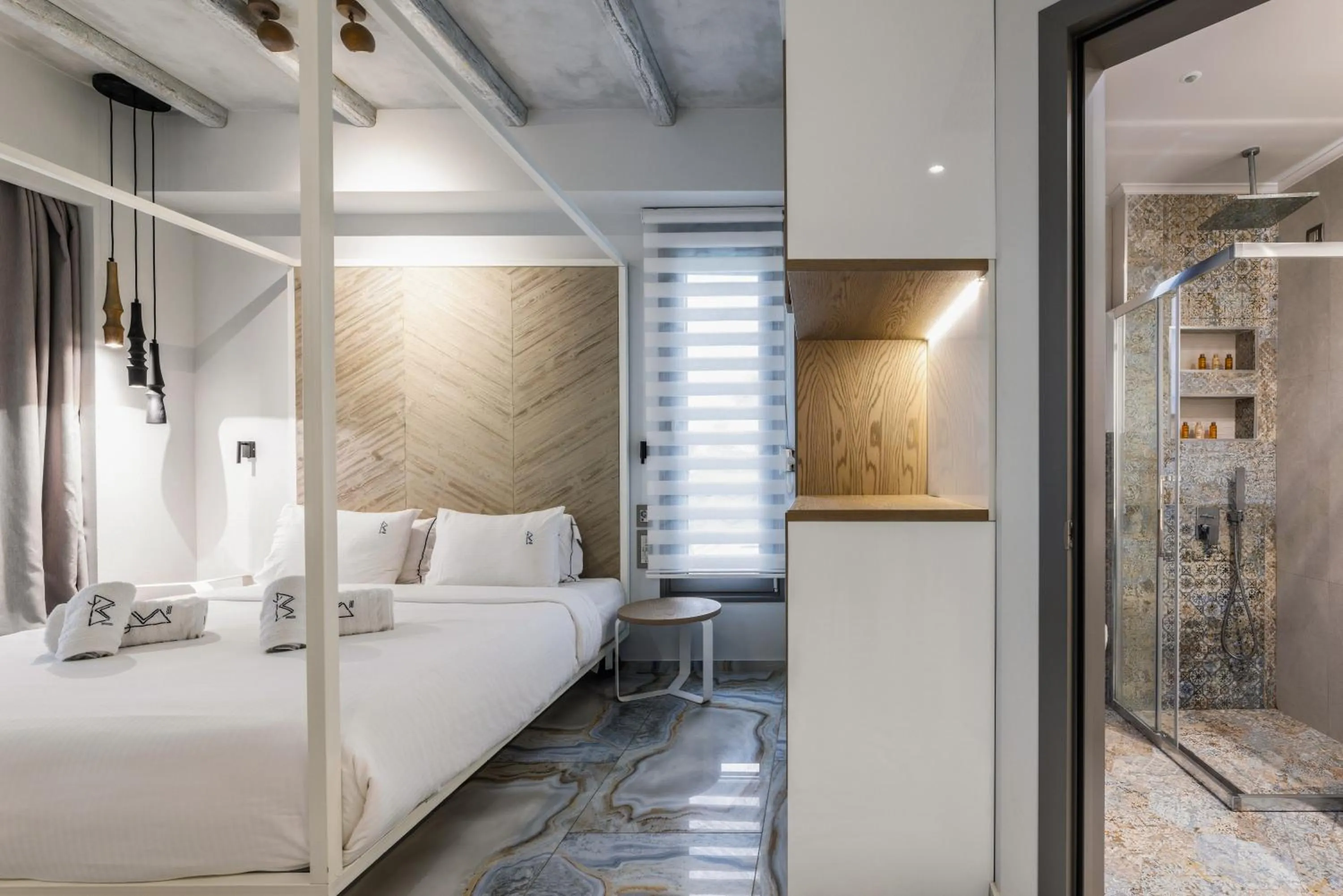 Bed in Blue Carpet Luxury Suites