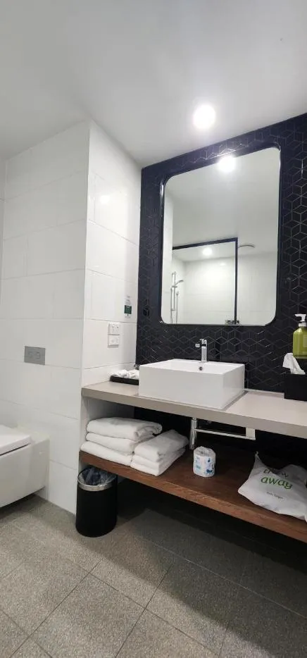Bathroom in Holiday Inn Sydney St Marys by IHG