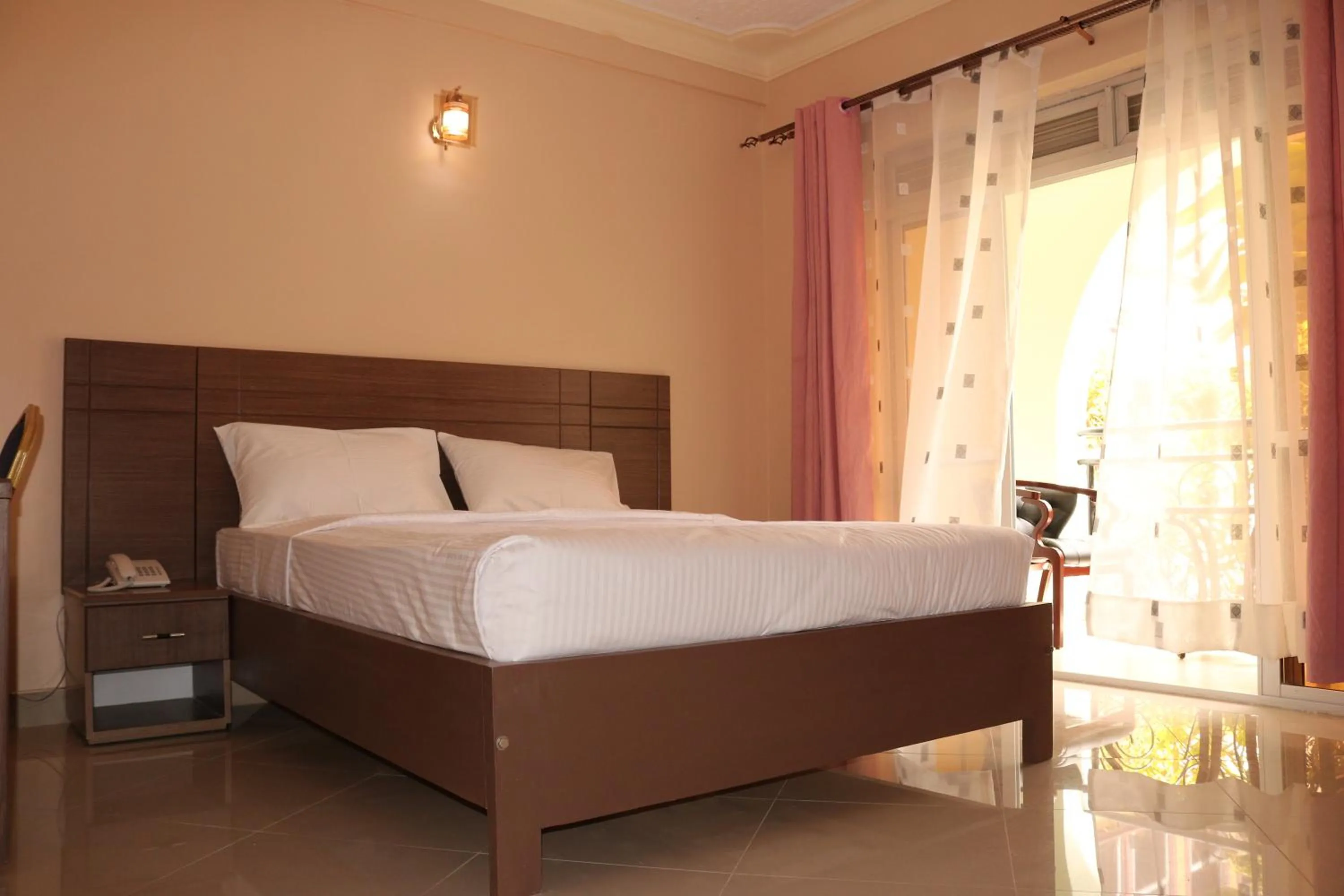 Bed in Agenda 2000 Hotels Ltd