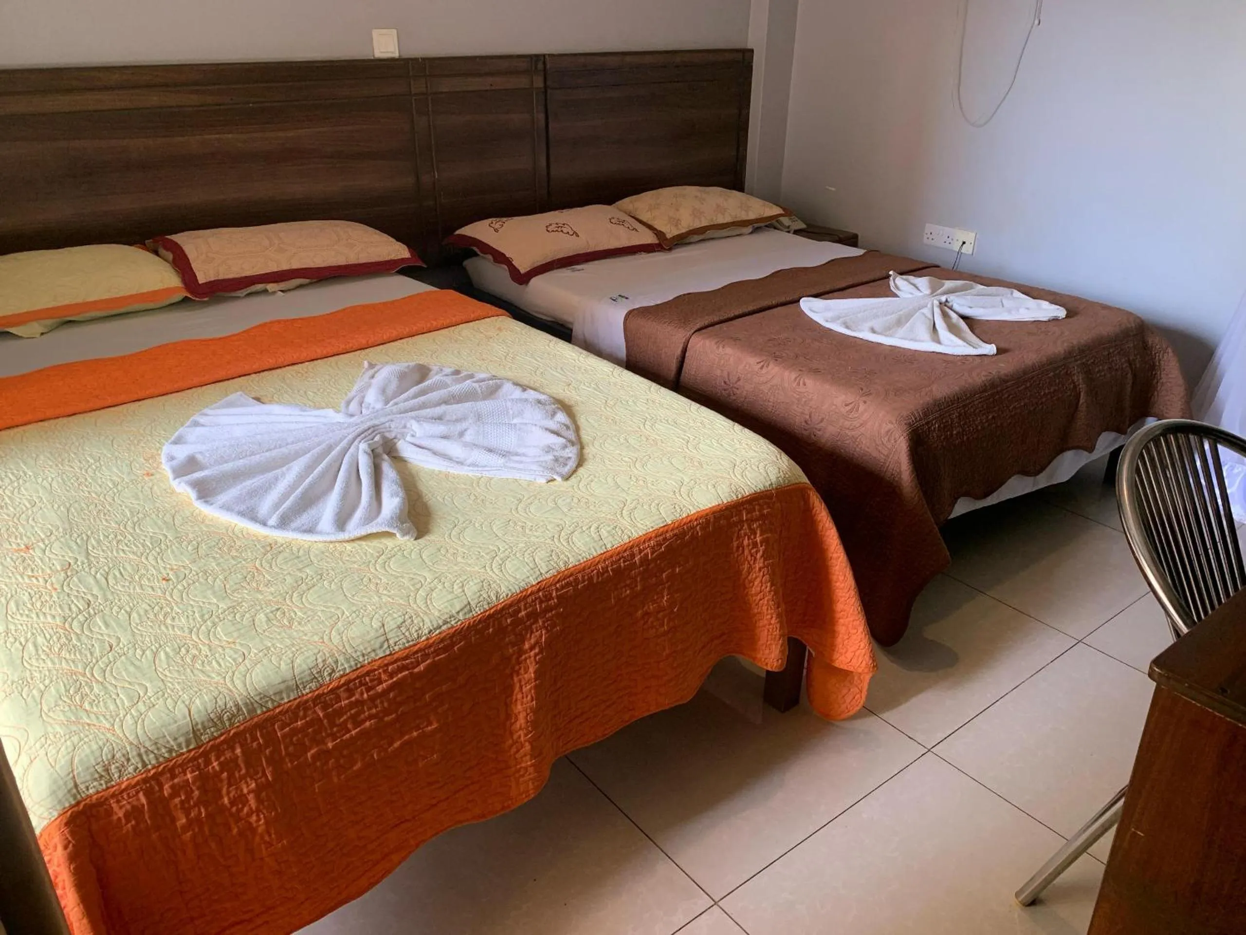 Bed in Agenda 2000 Hotels Ltd