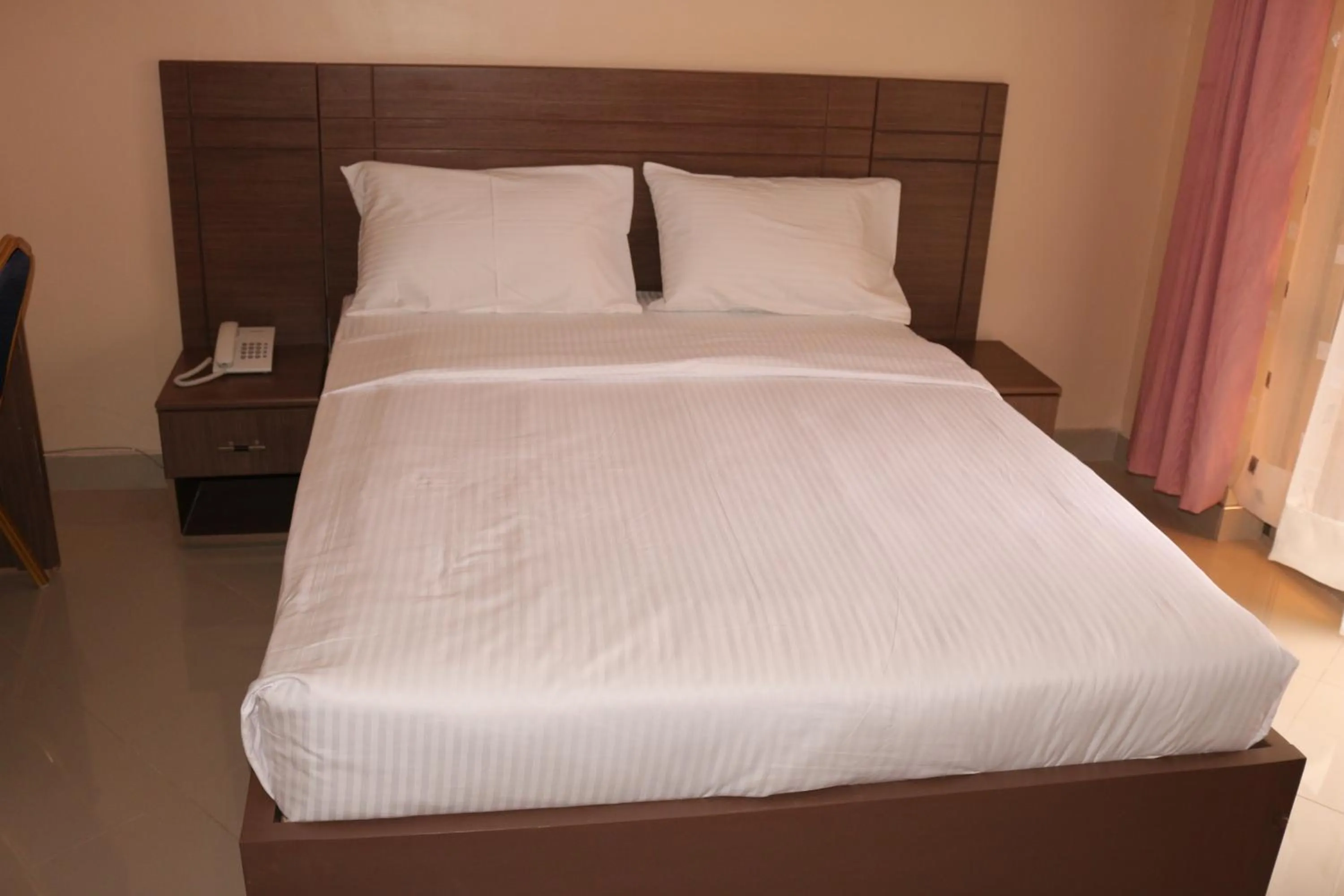 Bed in Agenda 2000 Hotels Ltd
