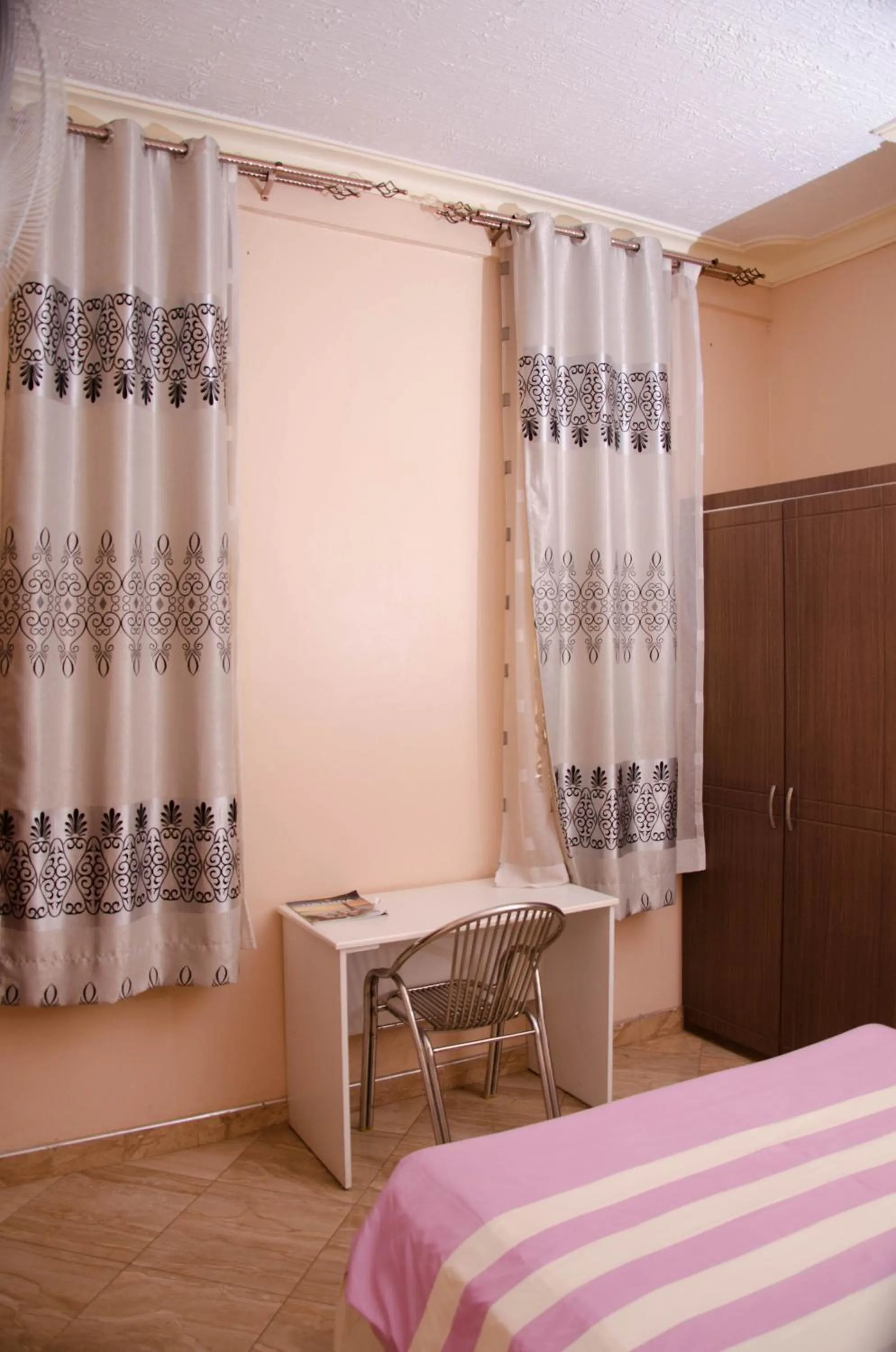 Bed in Agenda 2000 Hotels Ltd