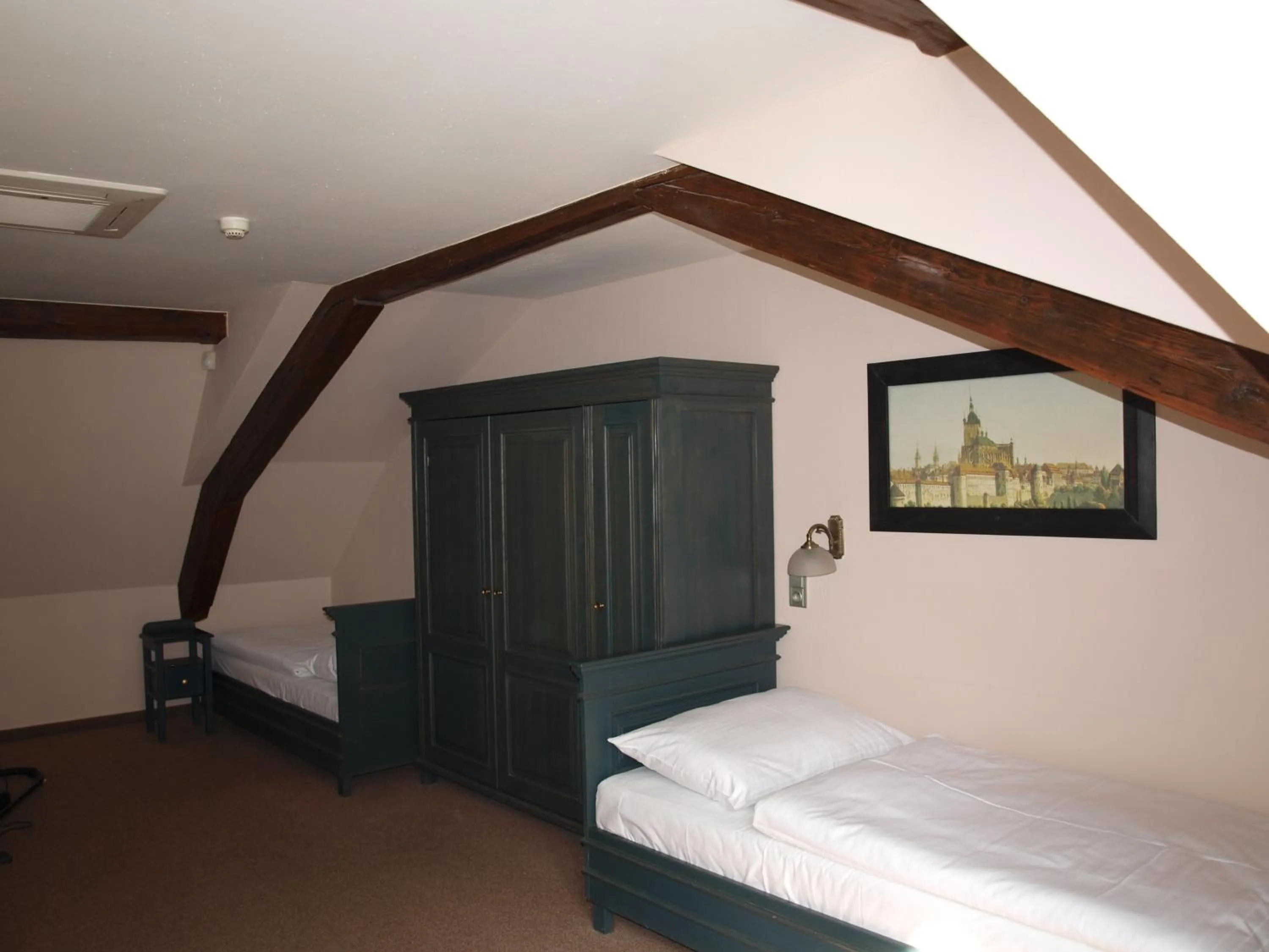 Bed in U Cervene zidle - Red Chair Hotel