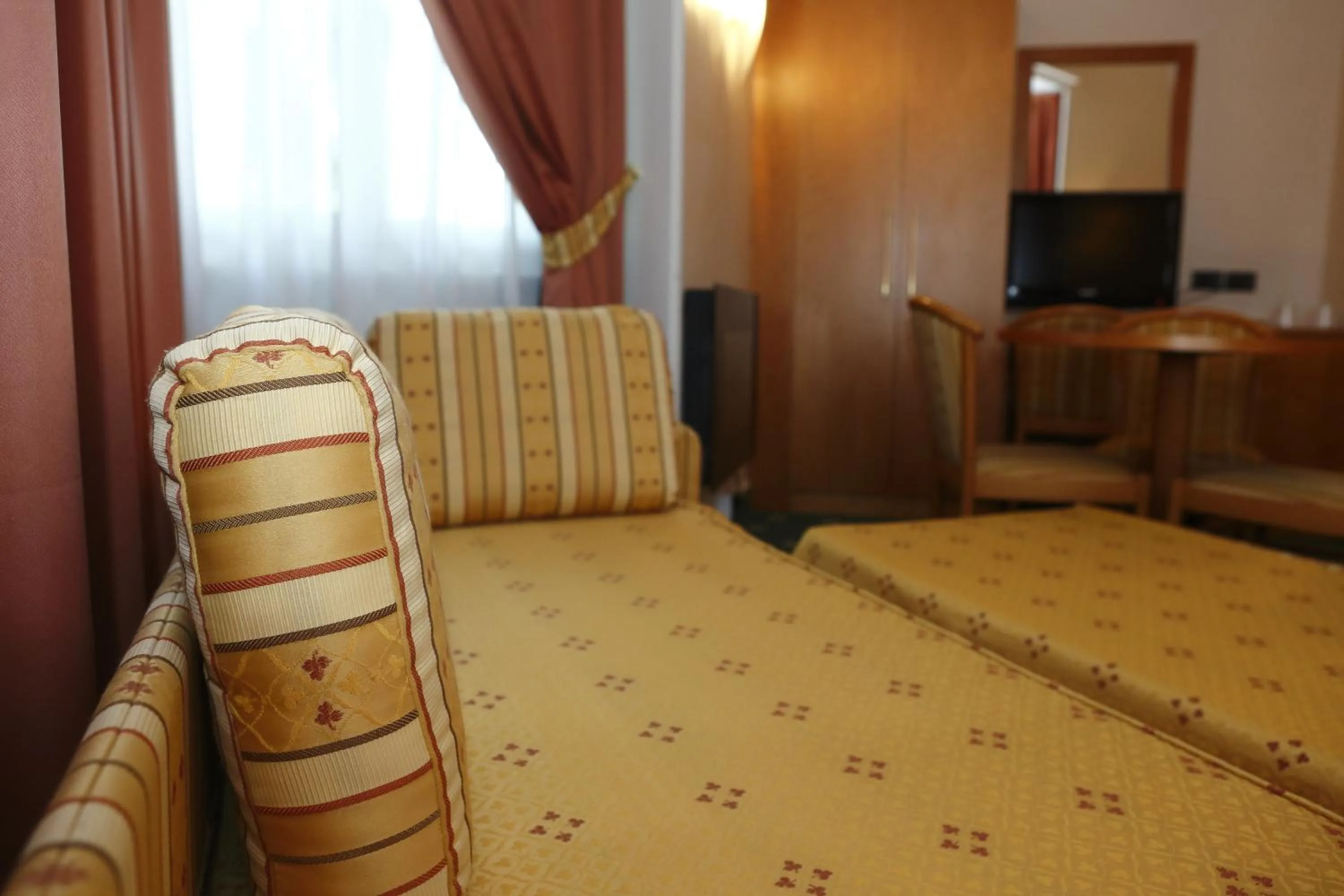 Seating area, Bed in Hotel Estense