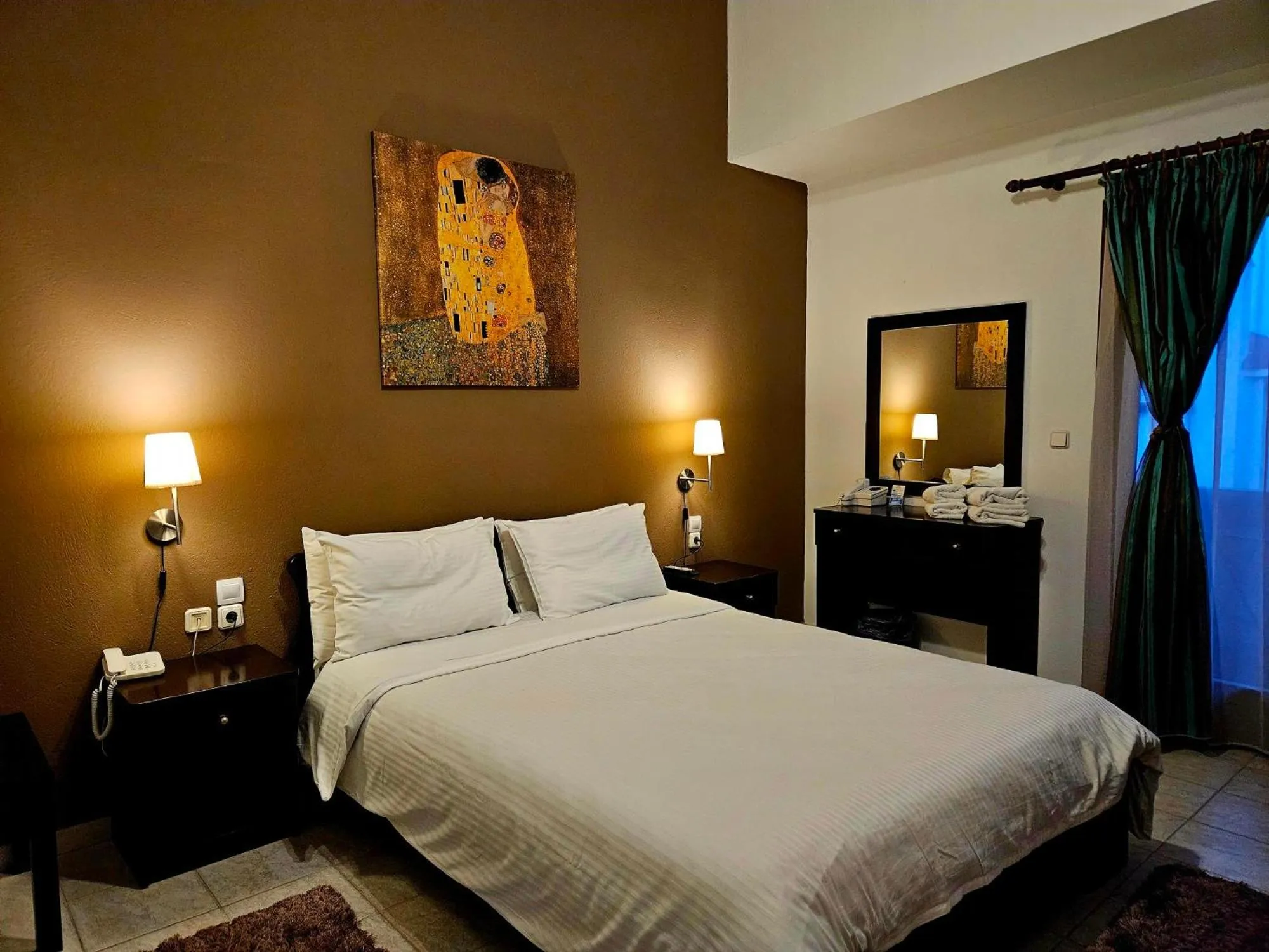 Bed in Hotel Odysseas