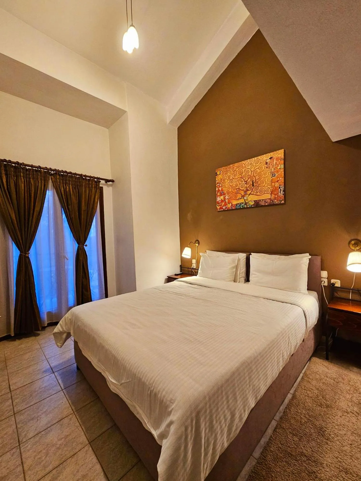 Bed in Hotel Odysseas