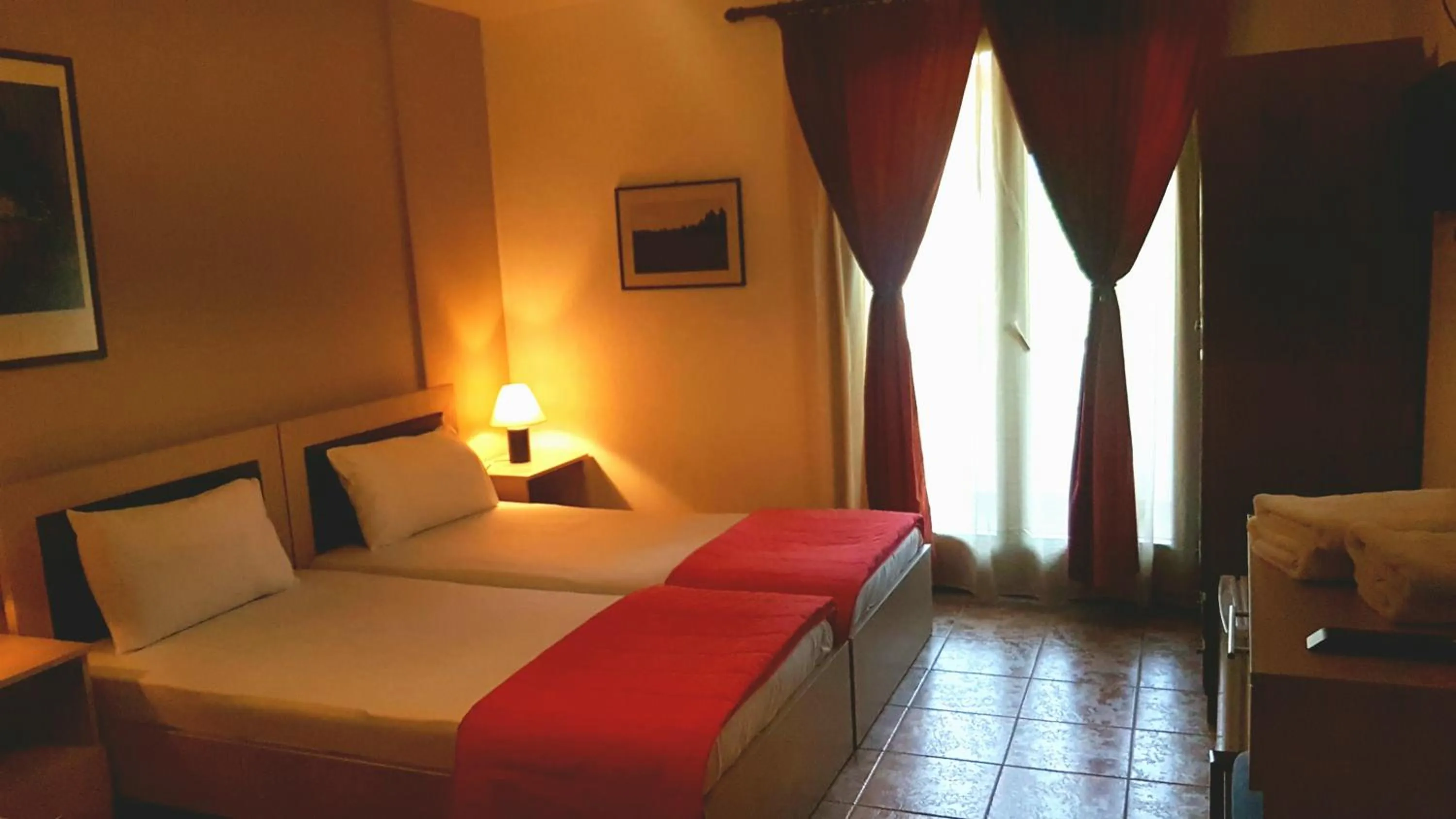 Bed in Hotel Odysseas