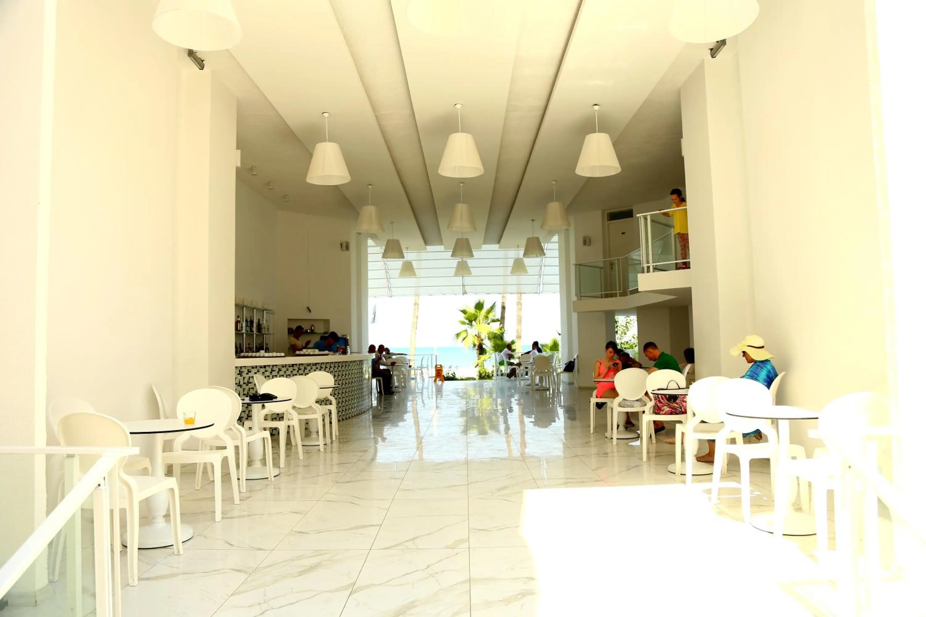 Lounge or bar in Olimpos Beach Hotel by RRH&R