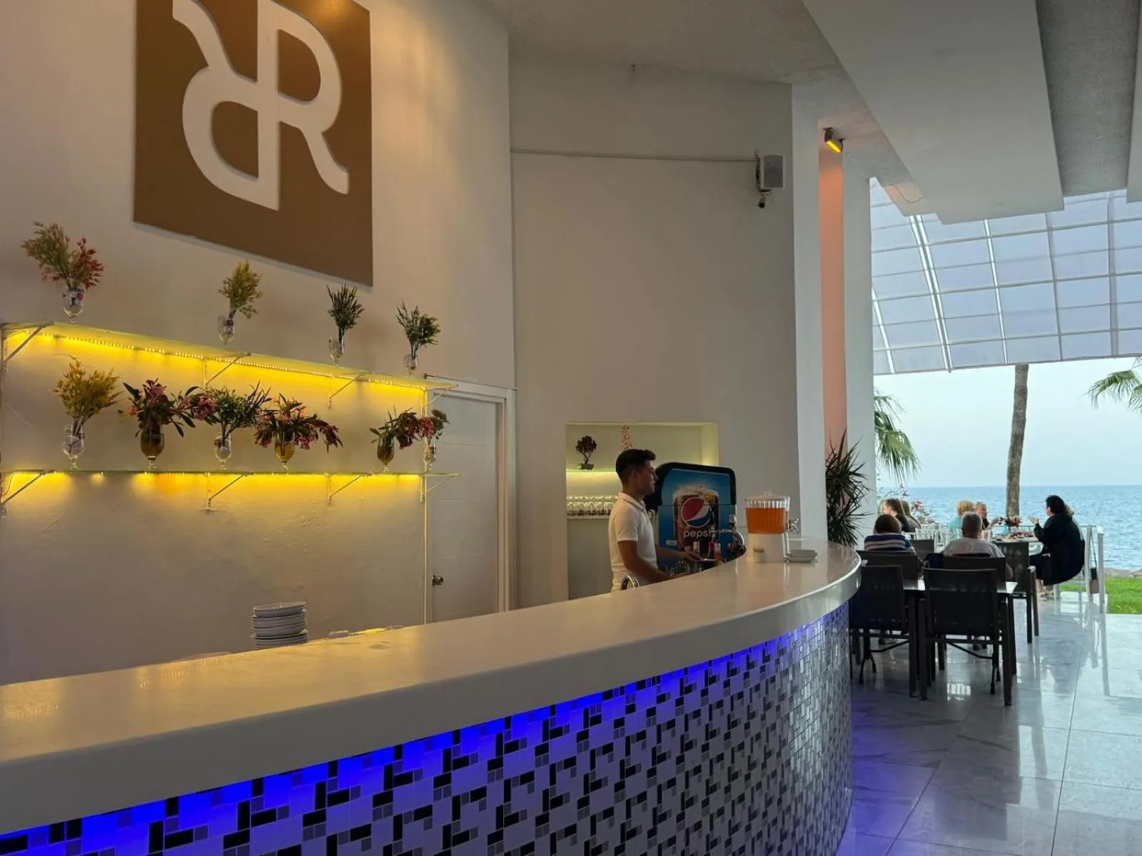 Lounge or bar in Olimpos Beach Hotel by RRH&R