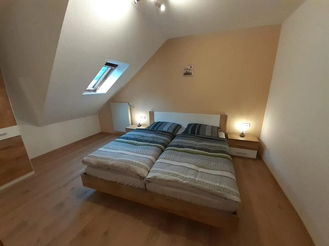 Bed in Ferienwohnung Viktoria