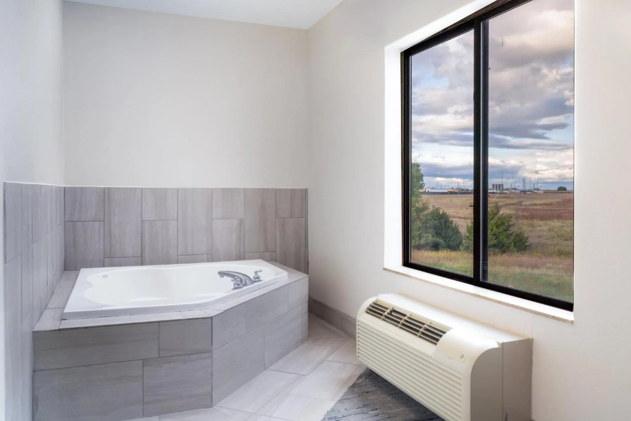 Bathroom in Holiday Inn Express Pratt by IHG