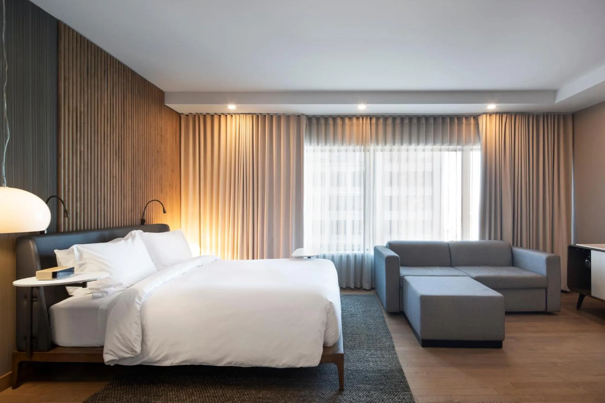 Bed in Hôtel Le Germain Montréal