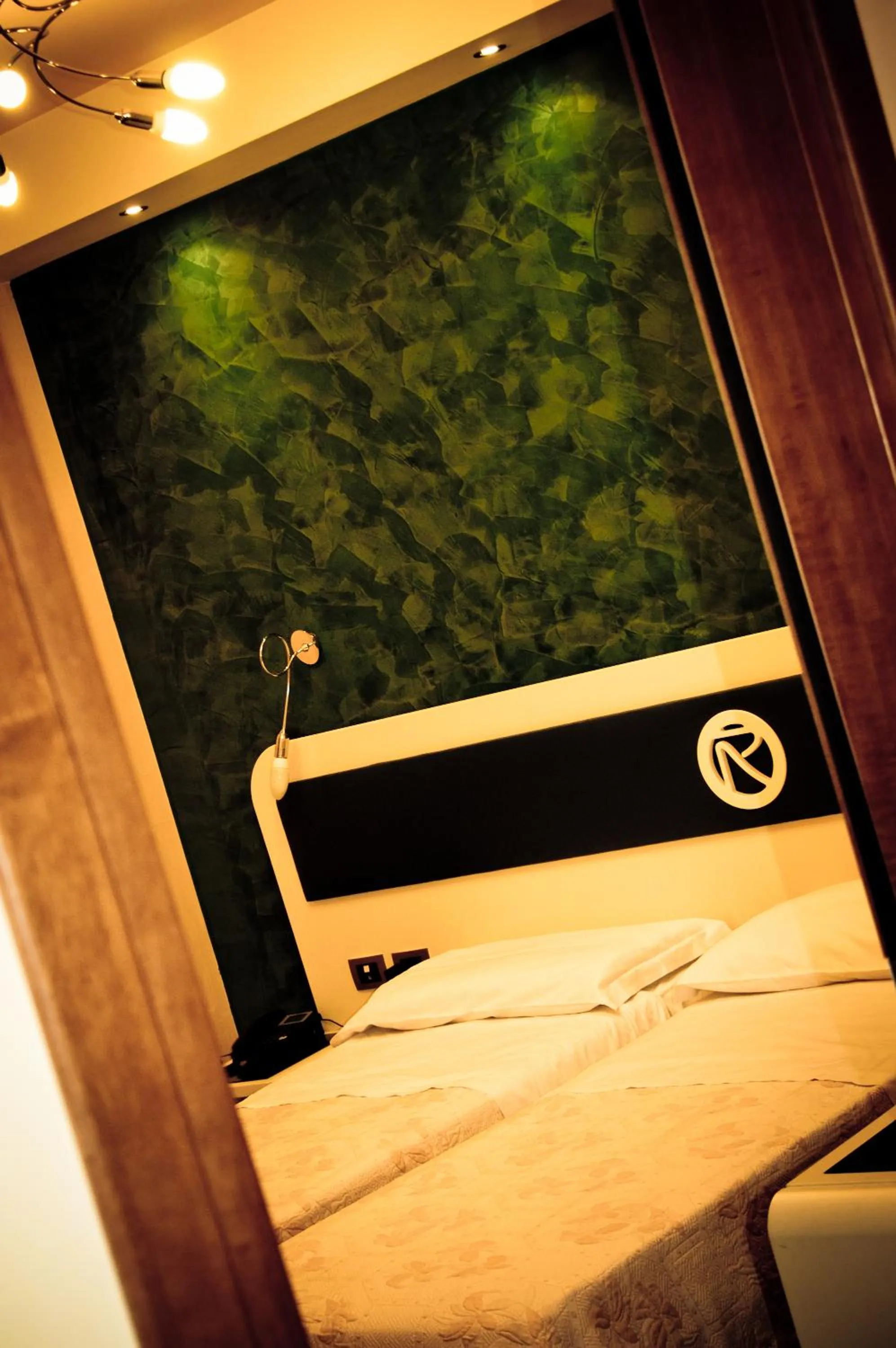 Bed in Aerhotel Phelipe