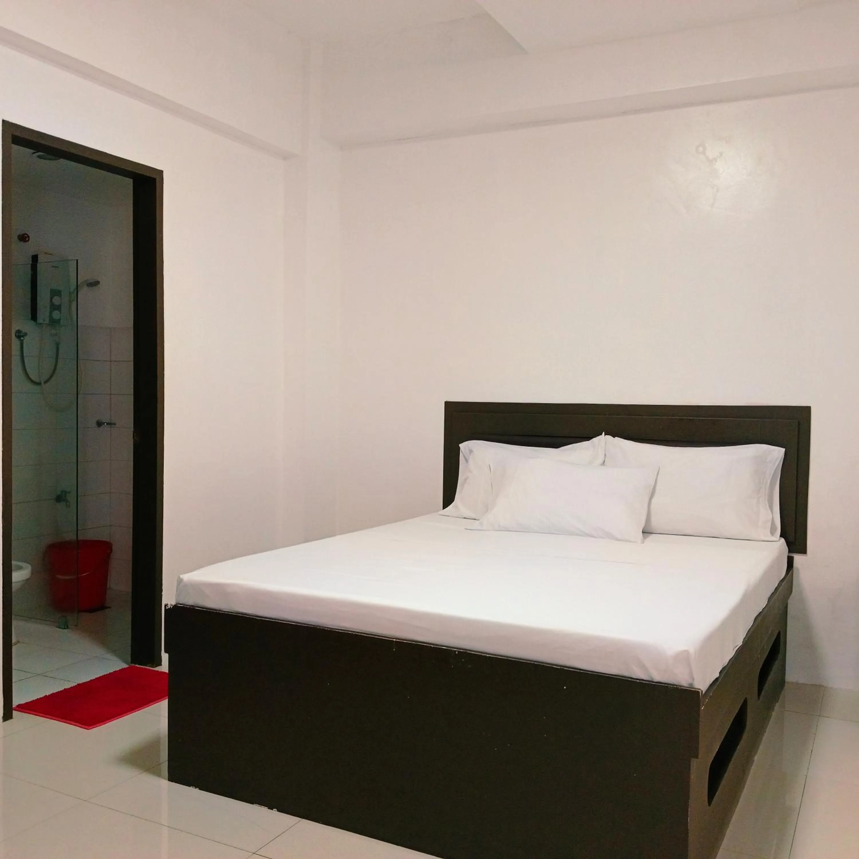 Bedroom, Bed in The Strand Suites and Dormitel