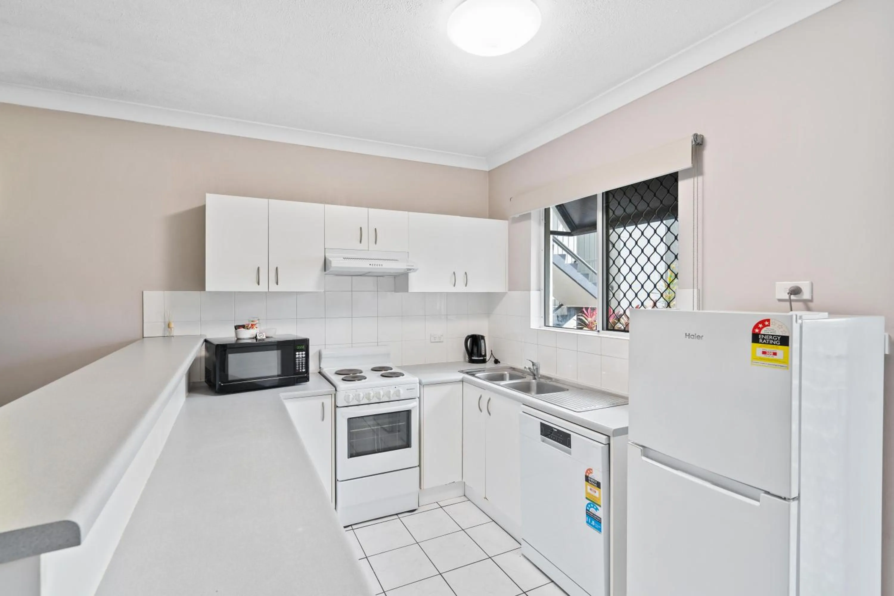 kitchen in Citysider Cairns Holiday Apartments