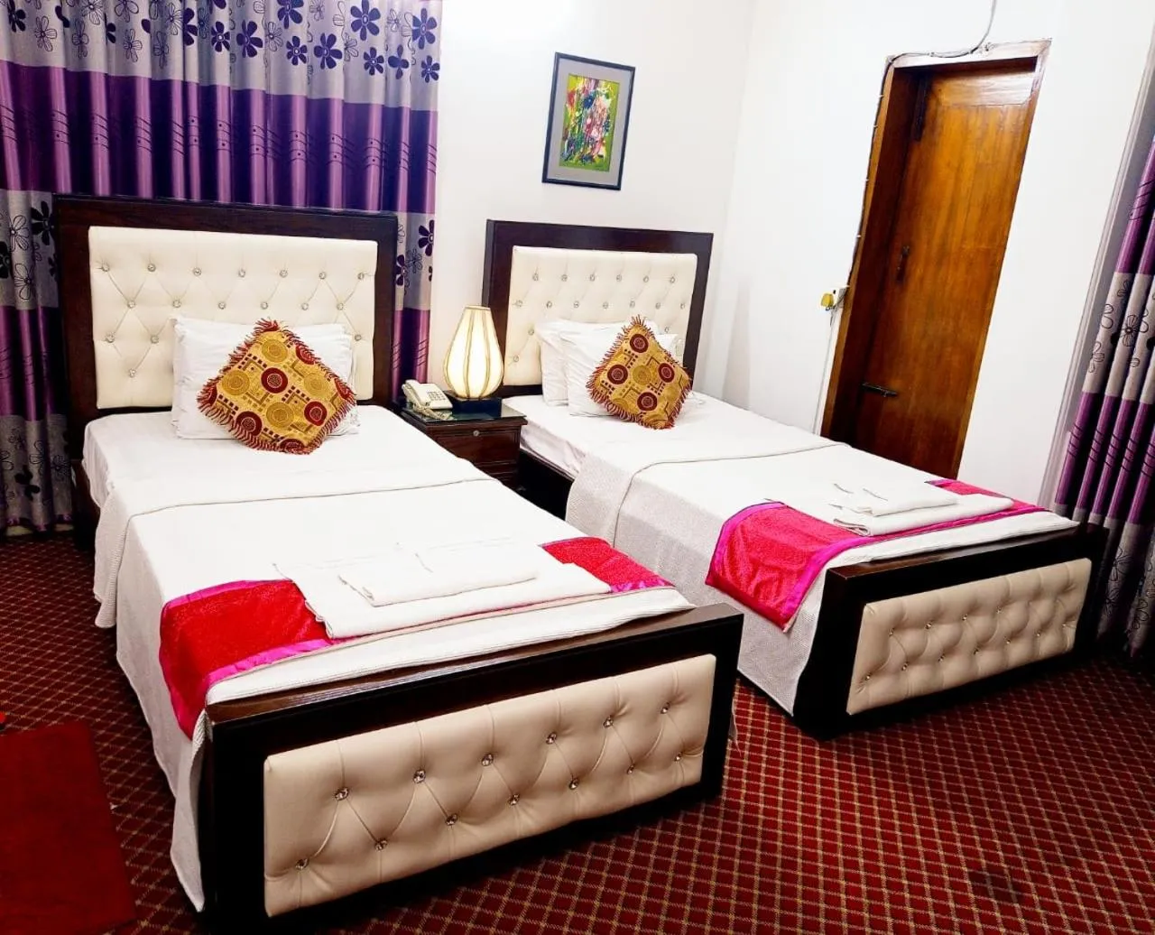 Bed in Hotel De Meridian Ltd
