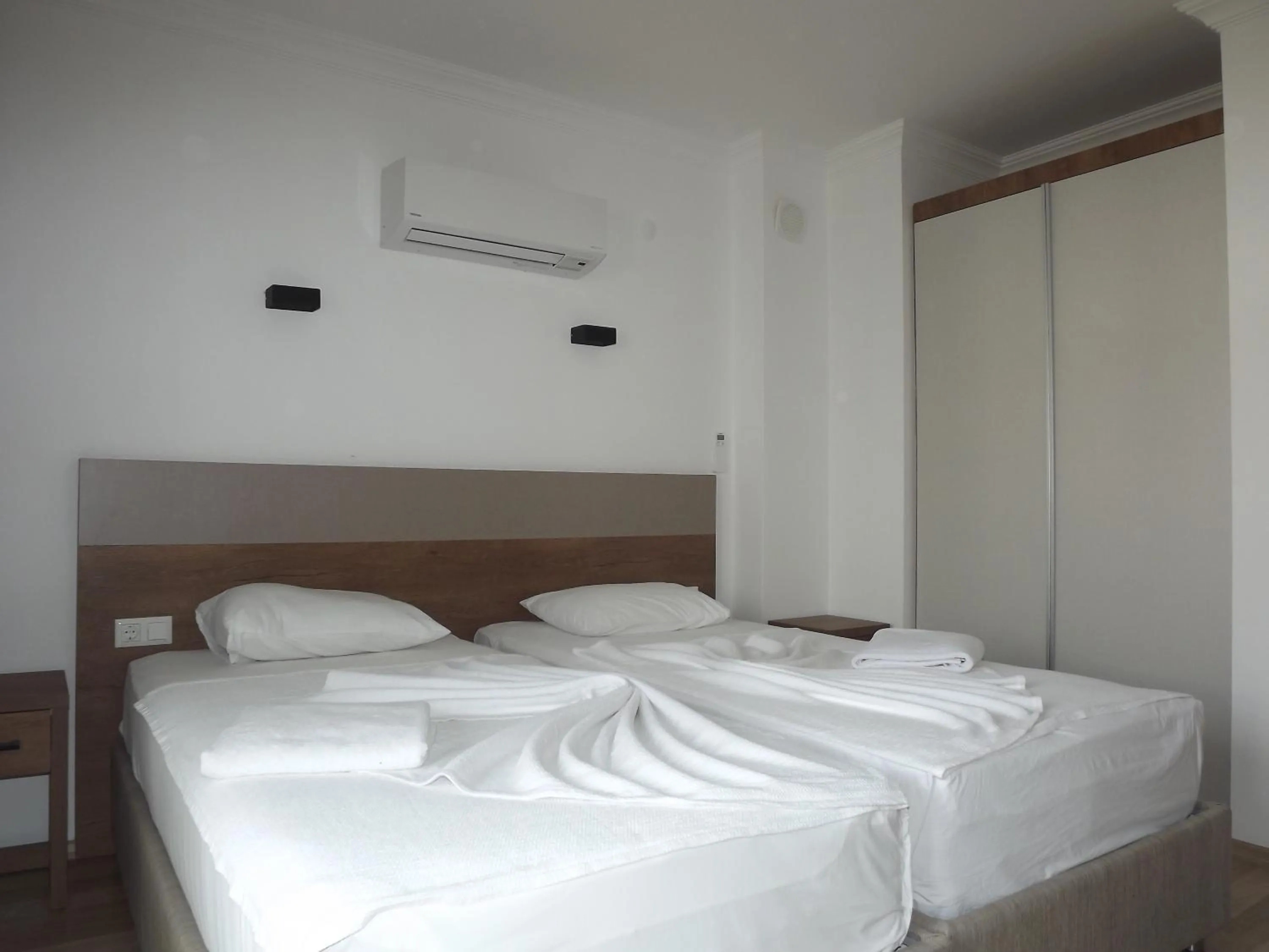 Bed in Opus Apart Hotel