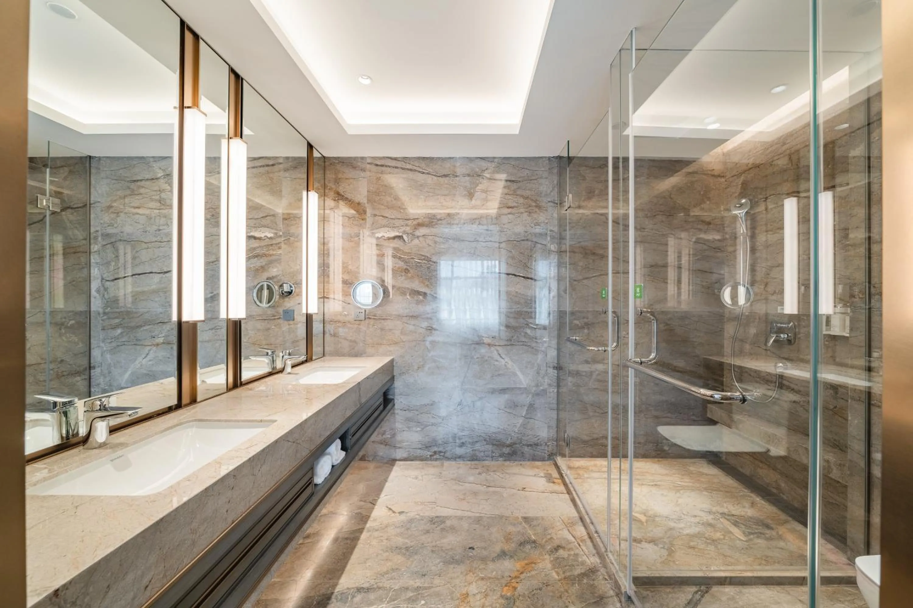 Bathroom in Holiday Inn Zhengzhou Zhongzhou by IHG