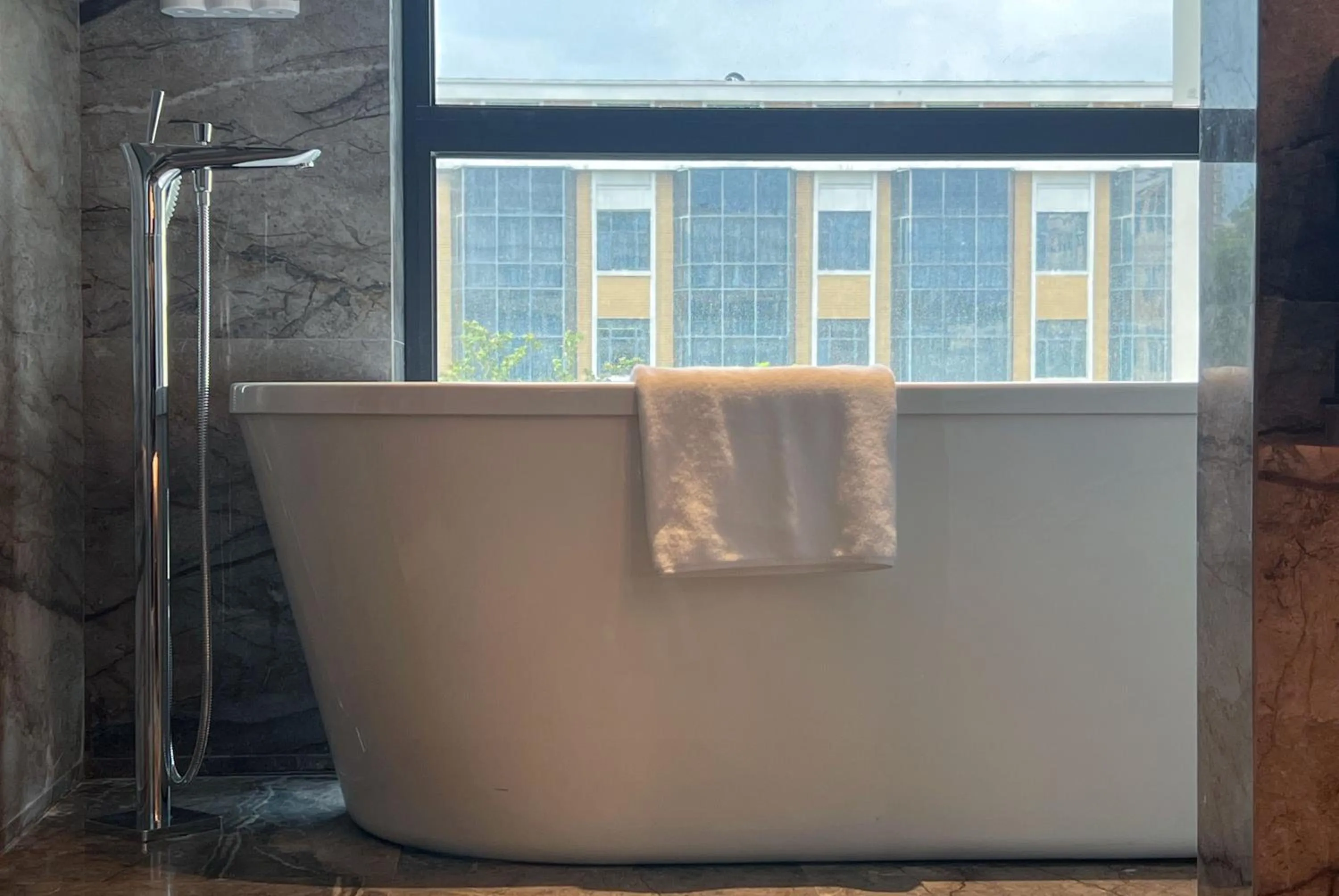 Bathroom in Holiday Inn Zhengzhou Zhongzhou by IHG