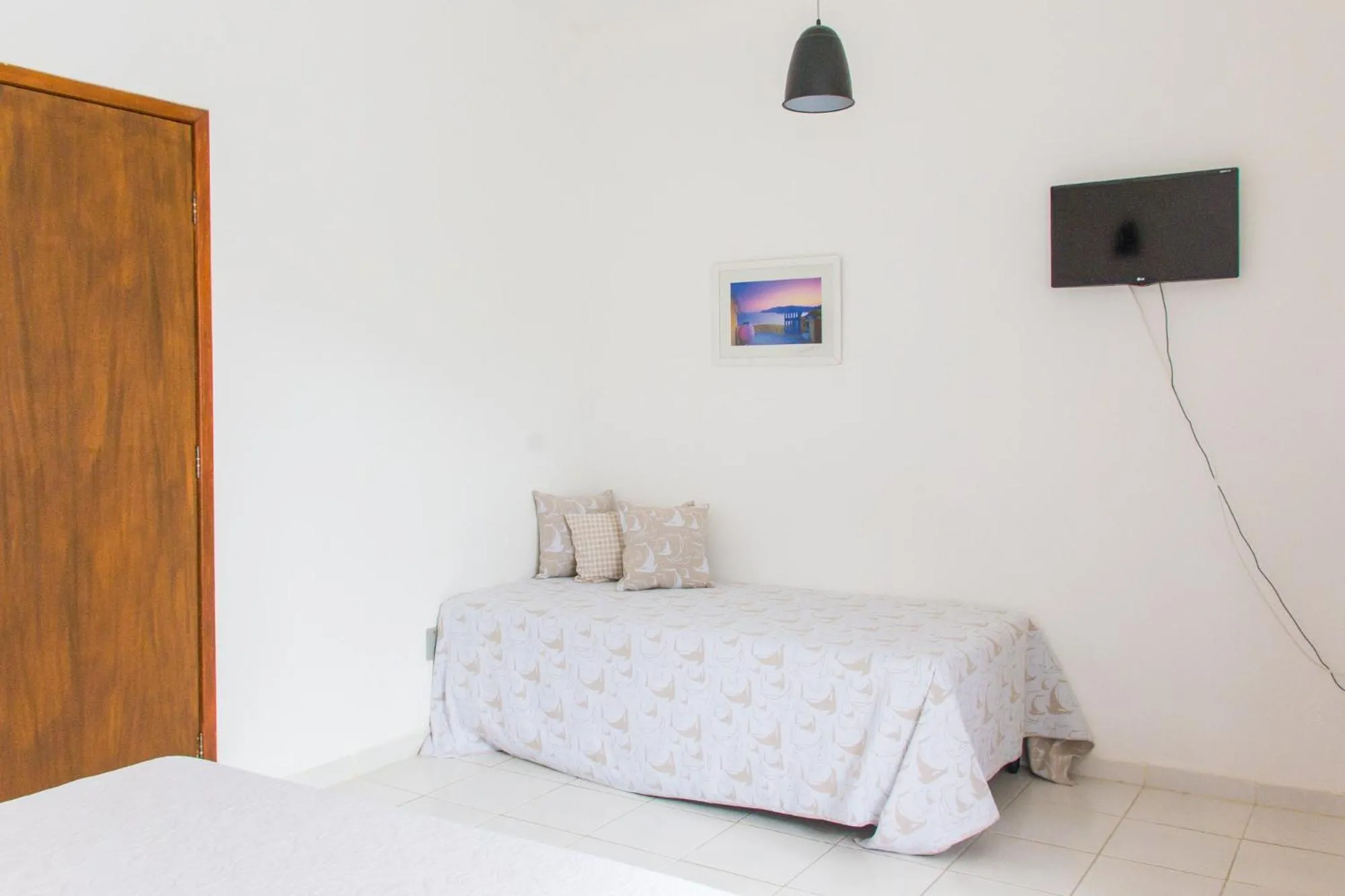 Bed in Viva Búzios Flats