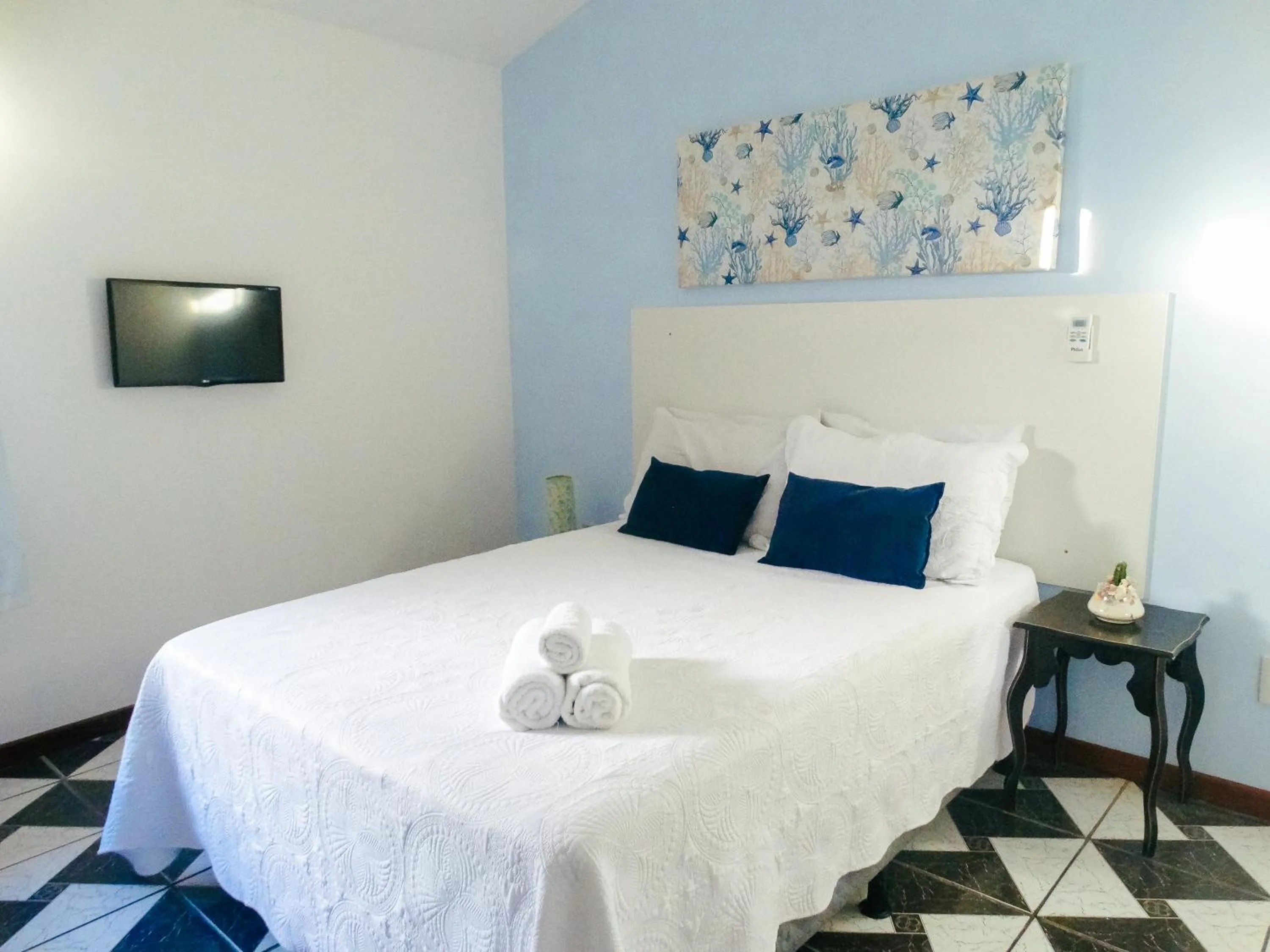 Bed in Viva Búzios Flats