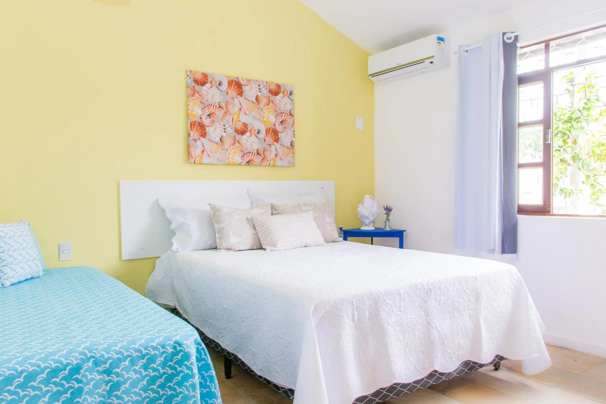 Bed in Viva Búzios Flats