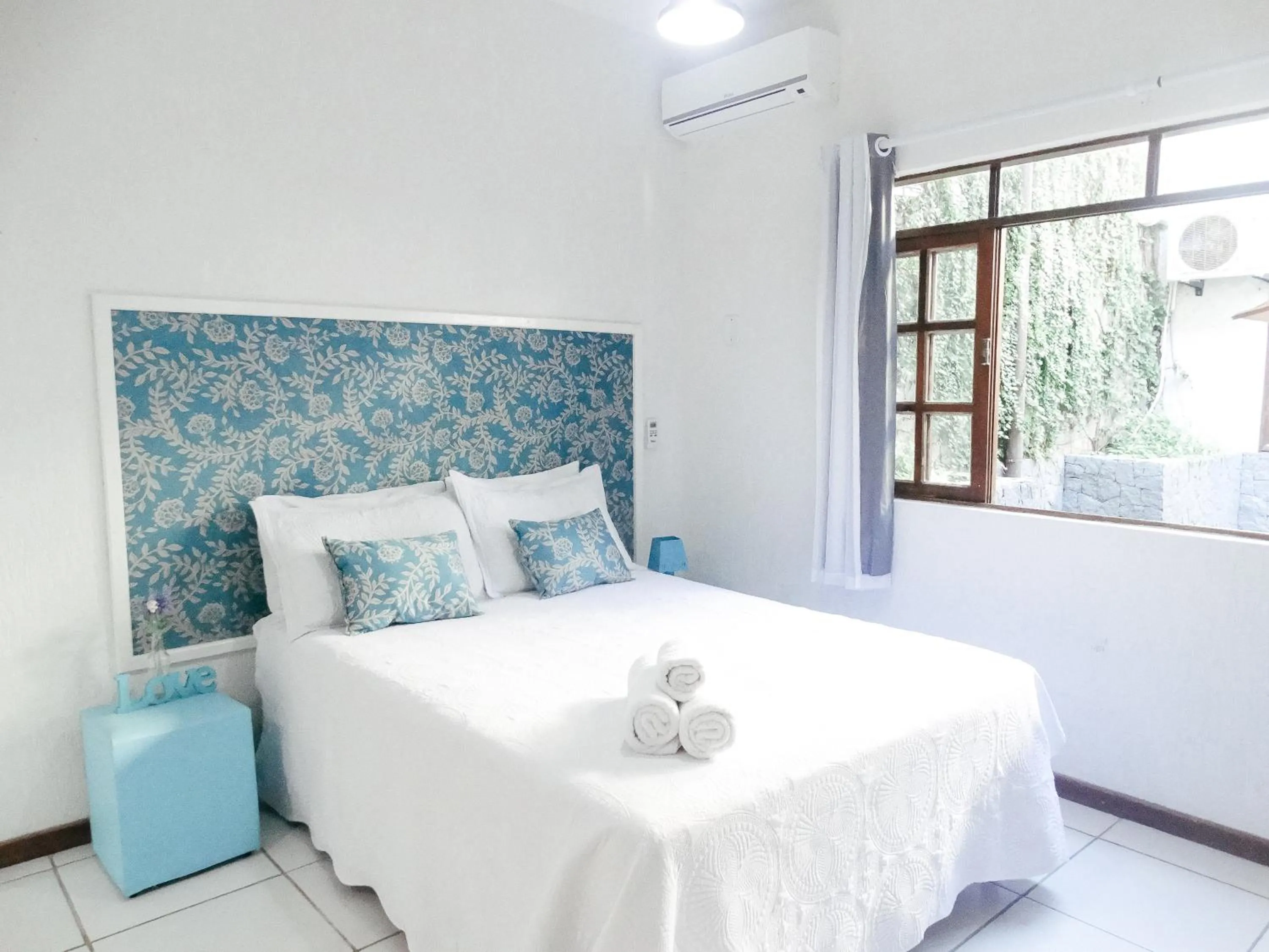 Bed in Viva Búzios Flats