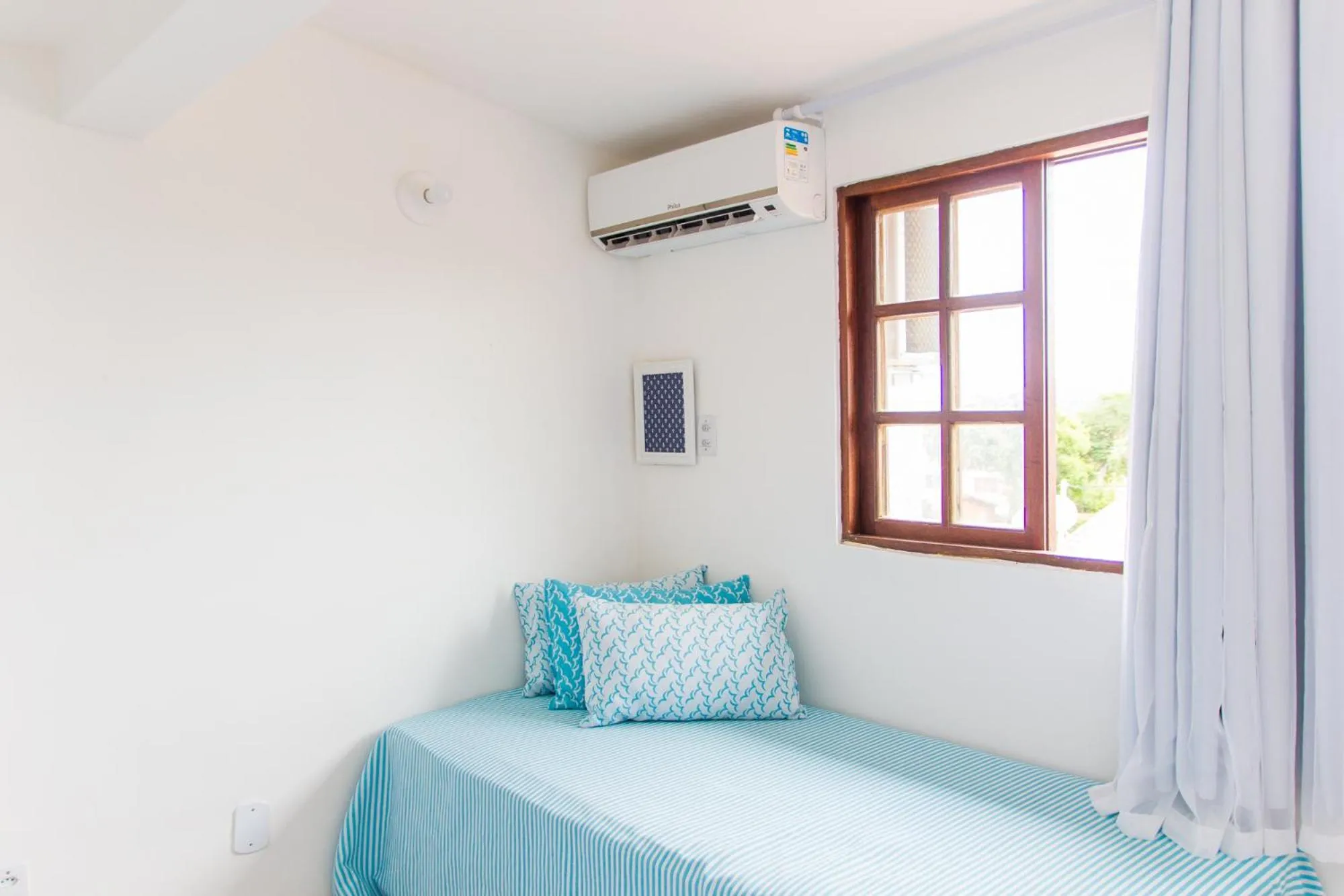 Bed in Viva Búzios Flats