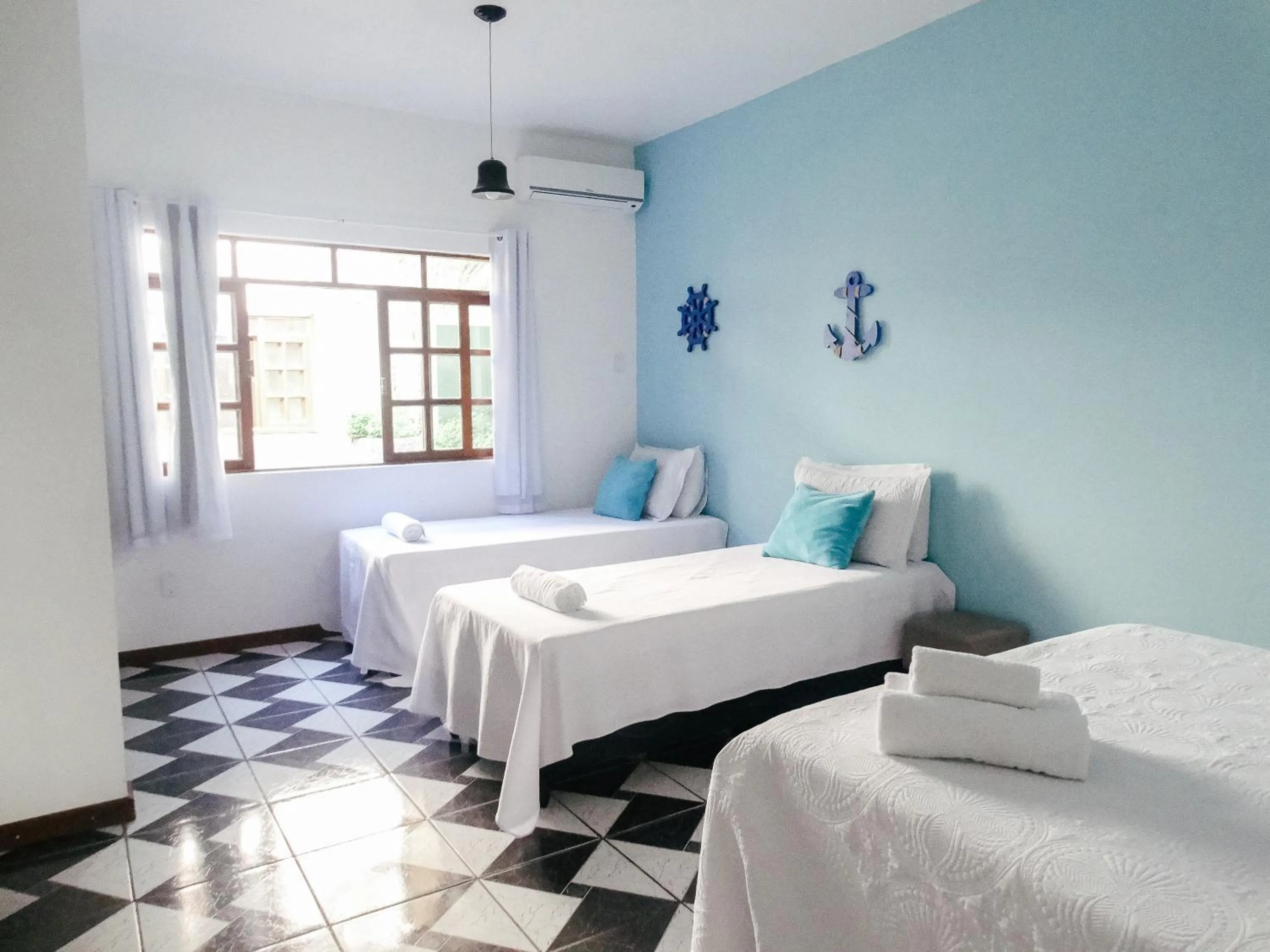 Bed in Viva Búzios Flats