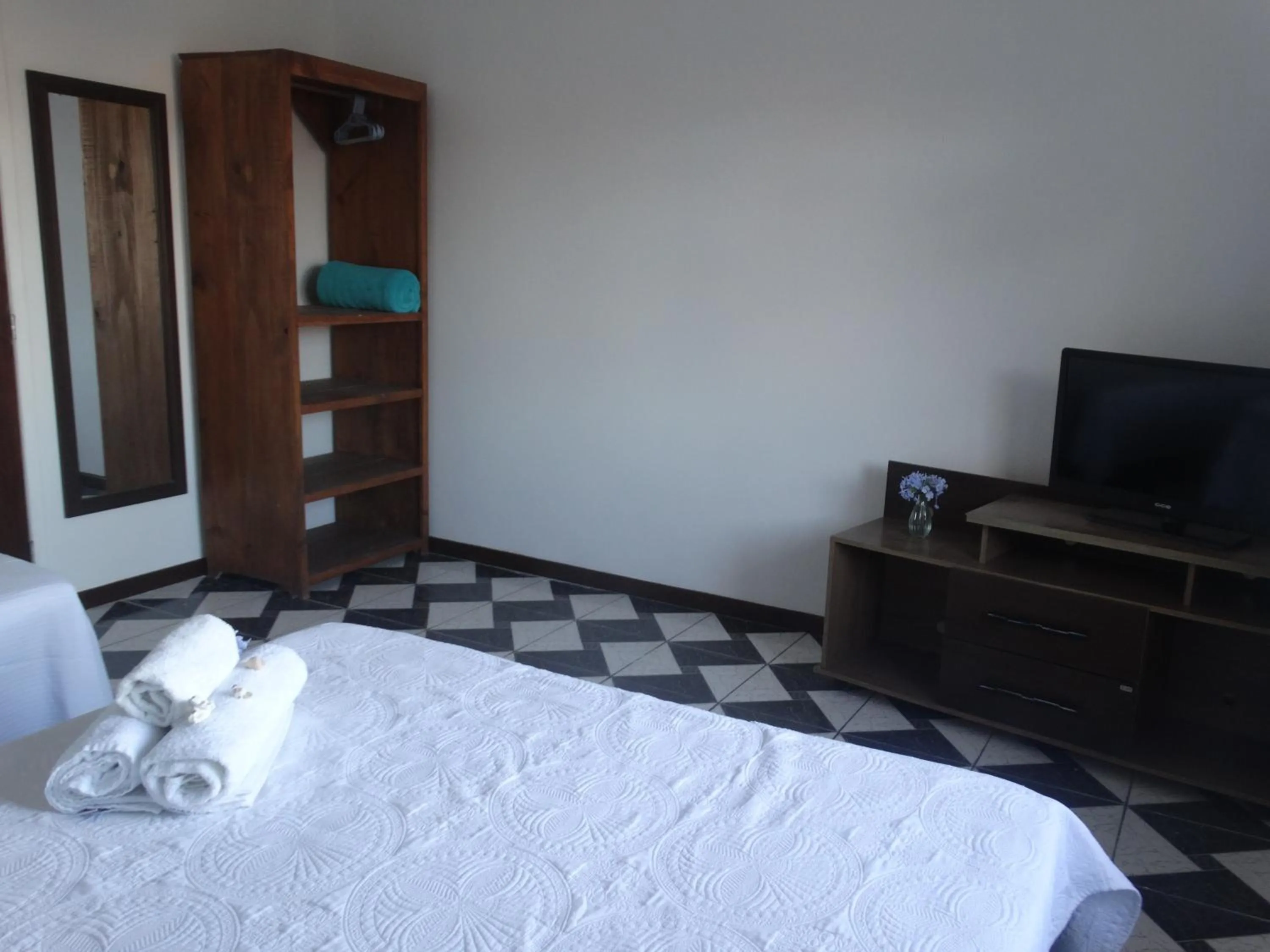 Bed in Viva Búzios Flats