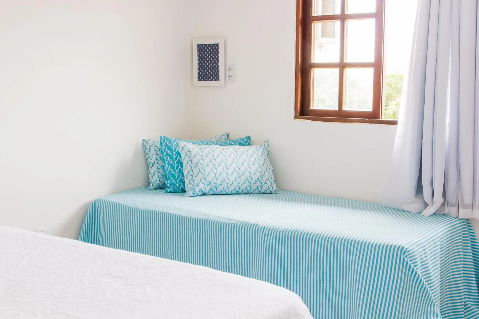 Bed in Viva Búzios Flats