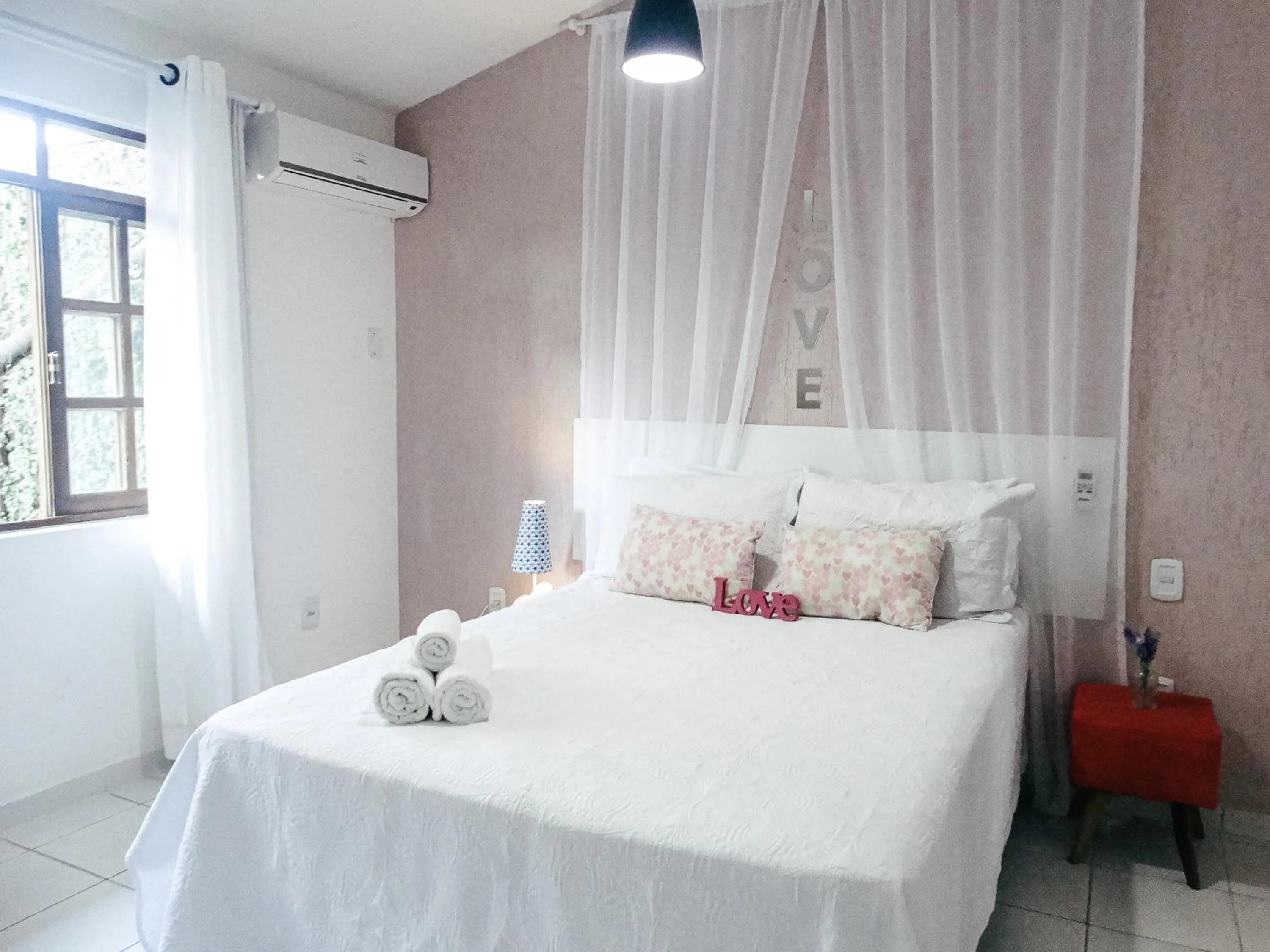Bed in Viva Búzios Flats