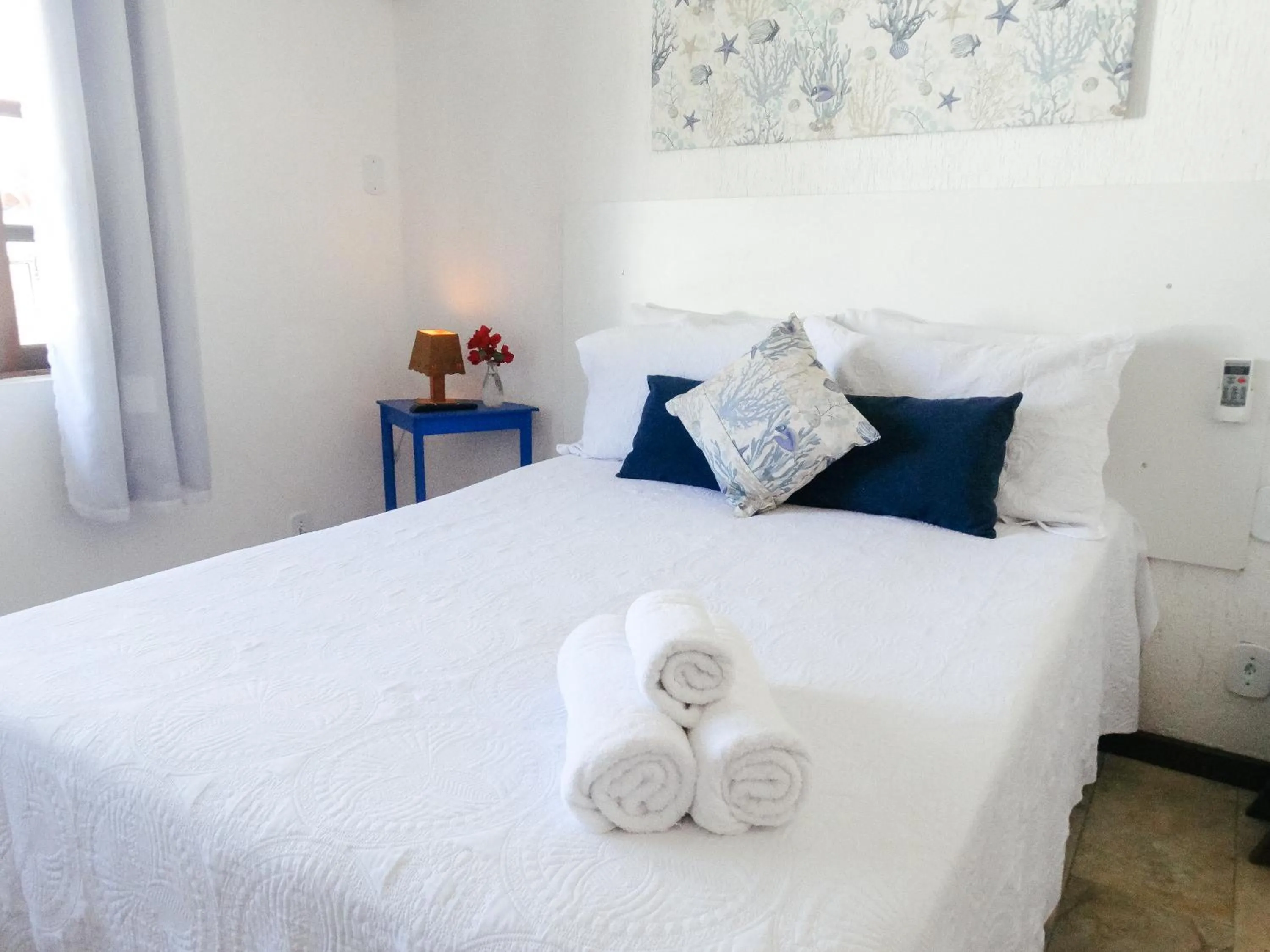 Bed in Viva Búzios Flats