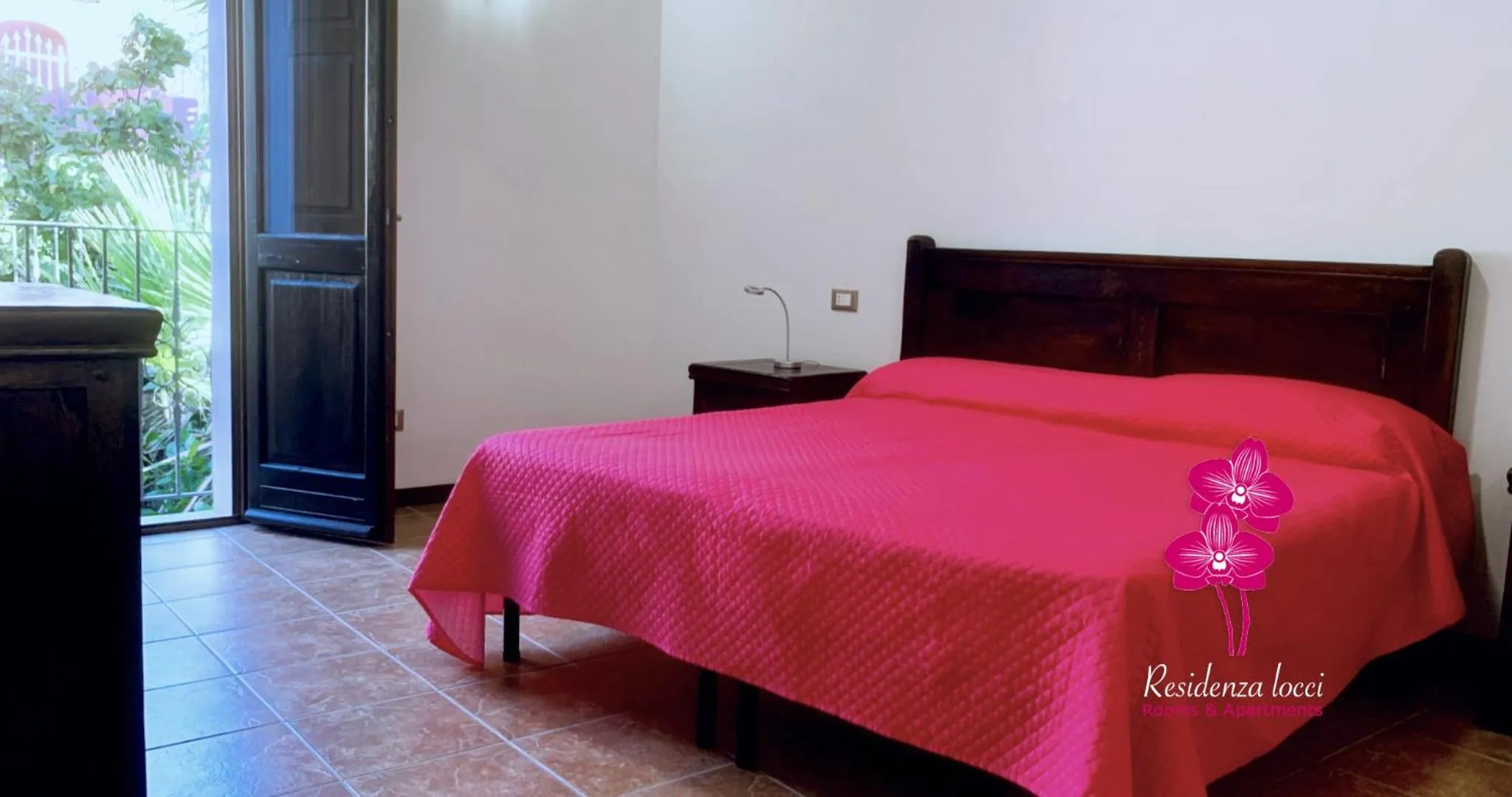 Bedroom, Bed in Residenza Locci - Rooms & Apartments