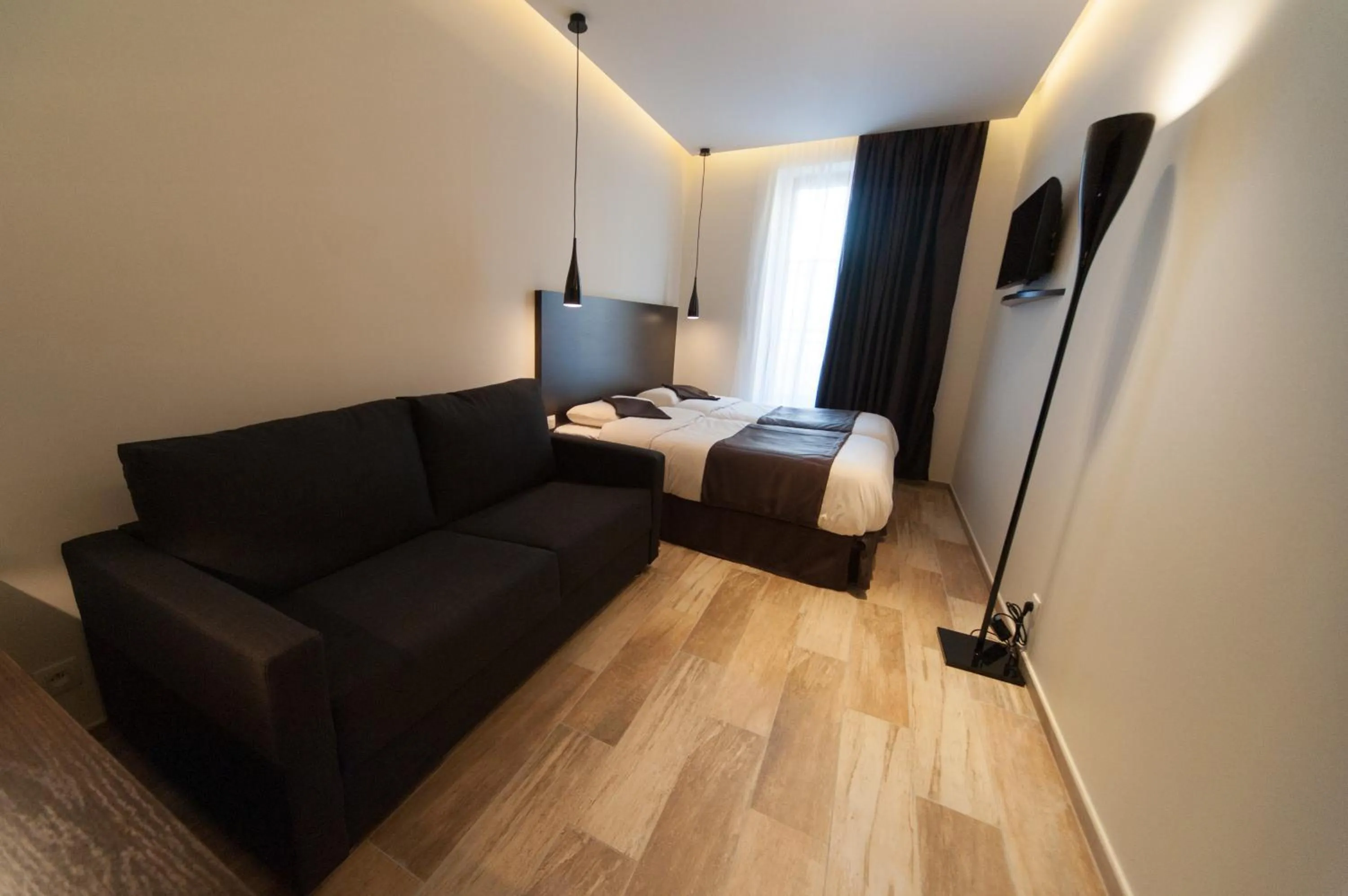 Photo of the whole room, Bed in Central Hotel