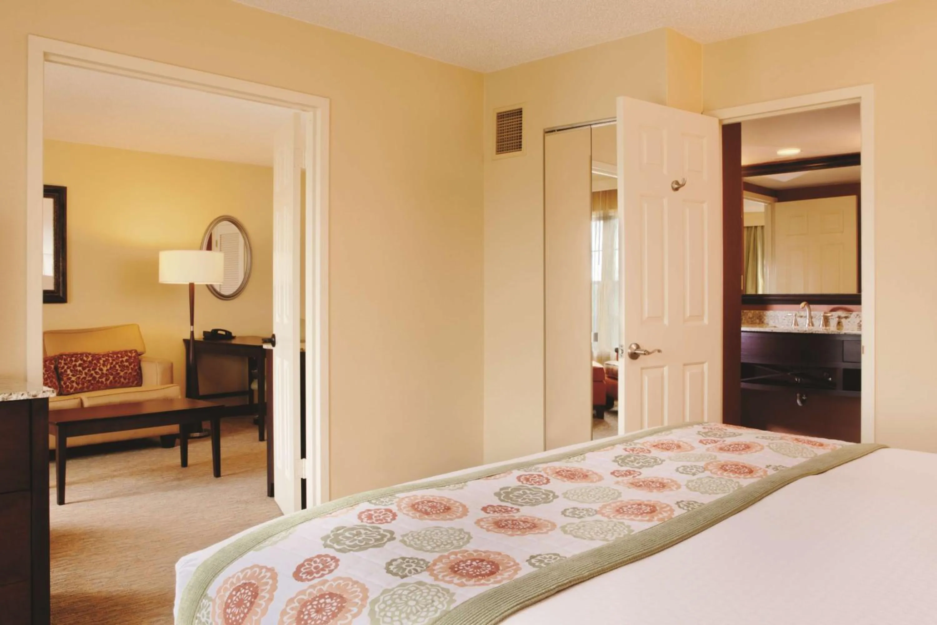 Living room, Bed in Doubletree Suites by Hilton at The Battery Atlanta