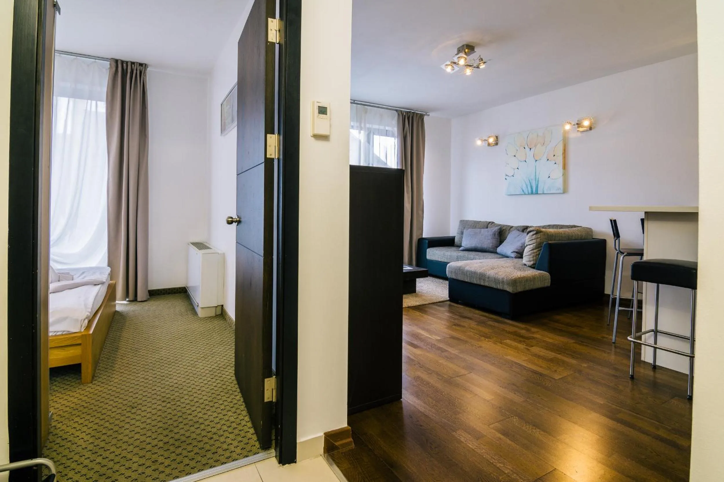 Living room, Bed in City Gardens Hotel & Wellness