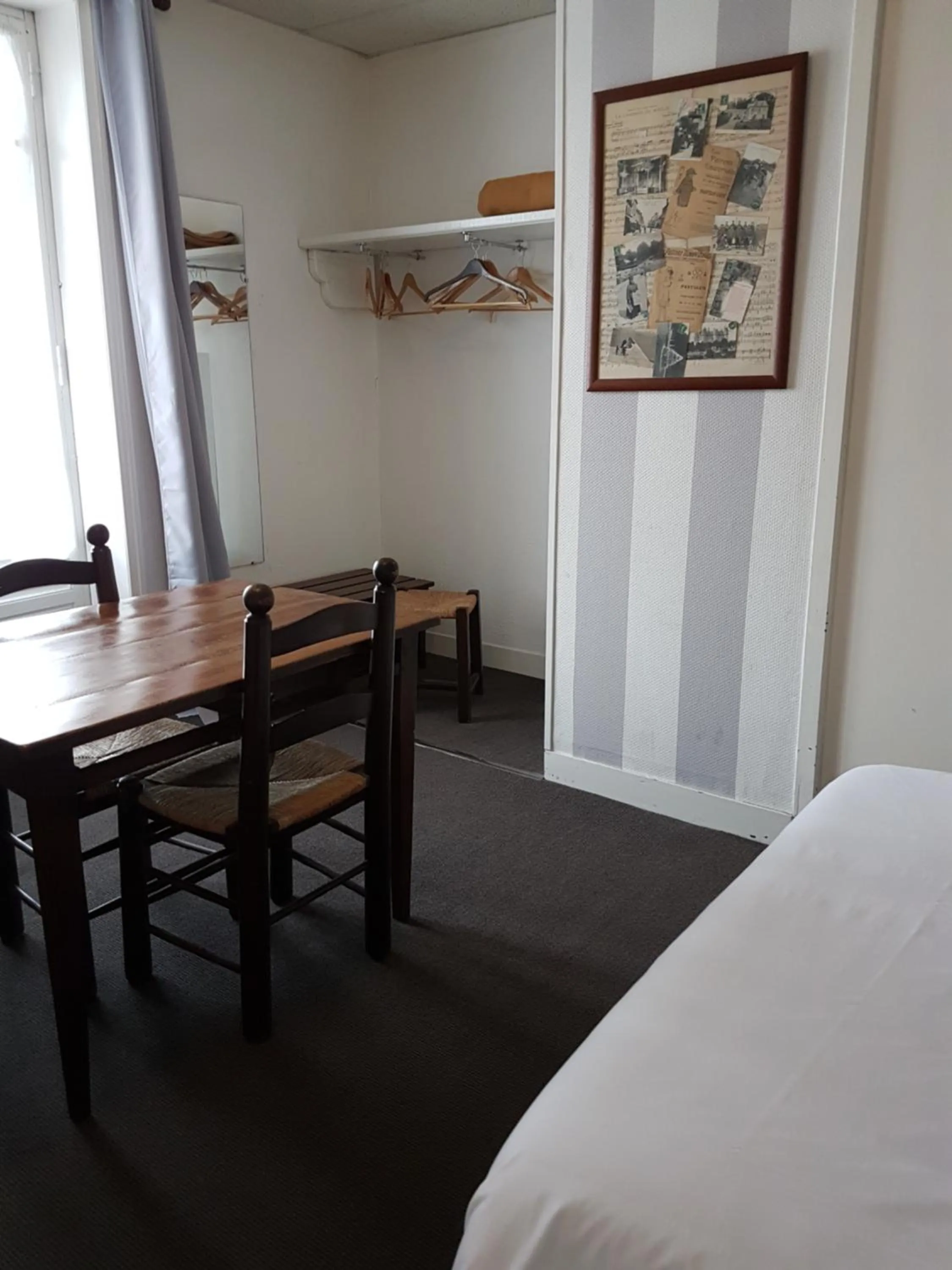 Photo of the whole room, Bed in Hotel de Normandie