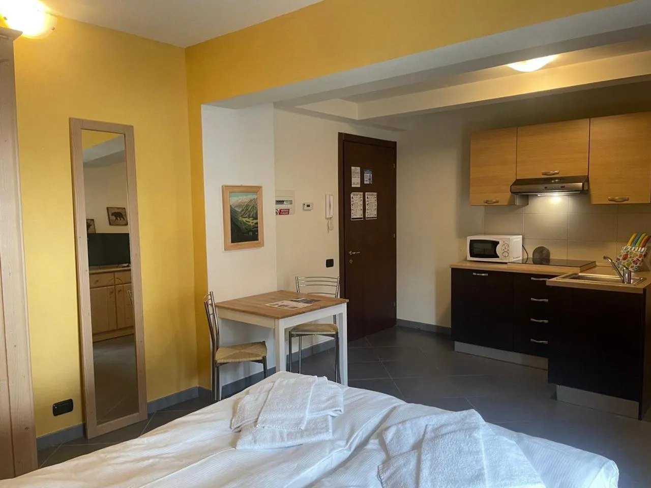 Living room, Bed in Residence Le Marmotte