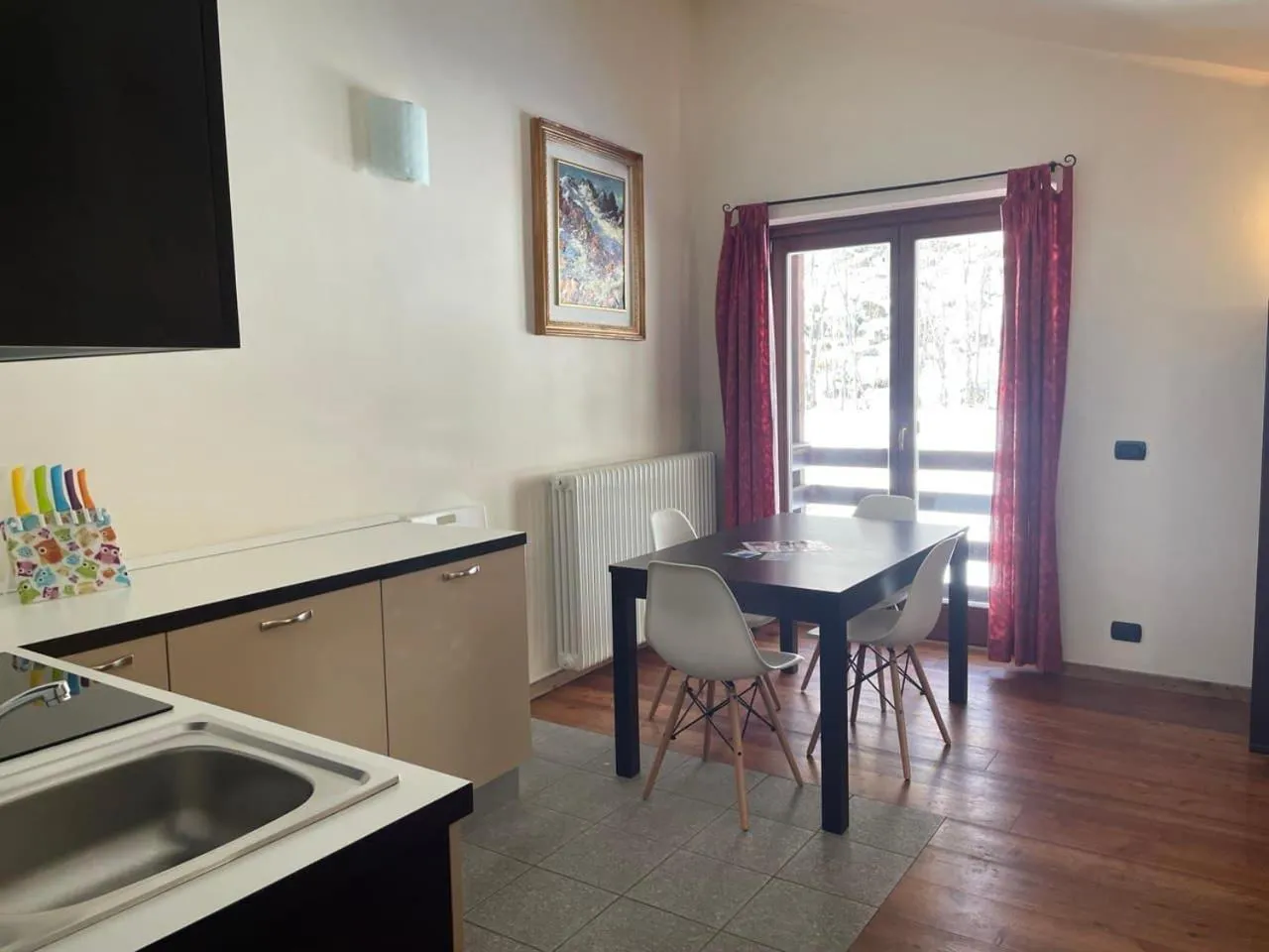 Kitchen or kitchenette in Residence Le Marmotte