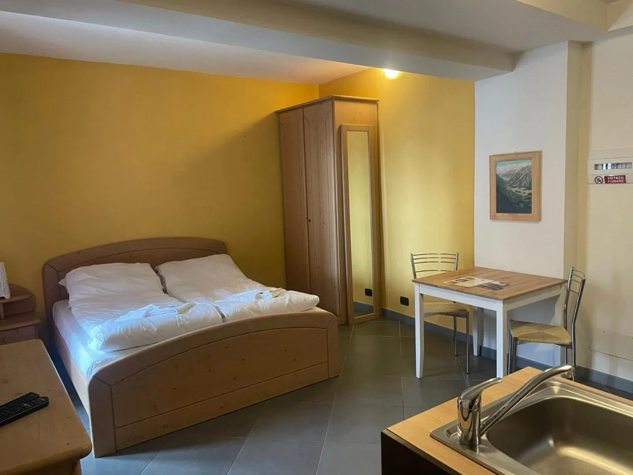 Living room, Bed in Residence Le Marmotte