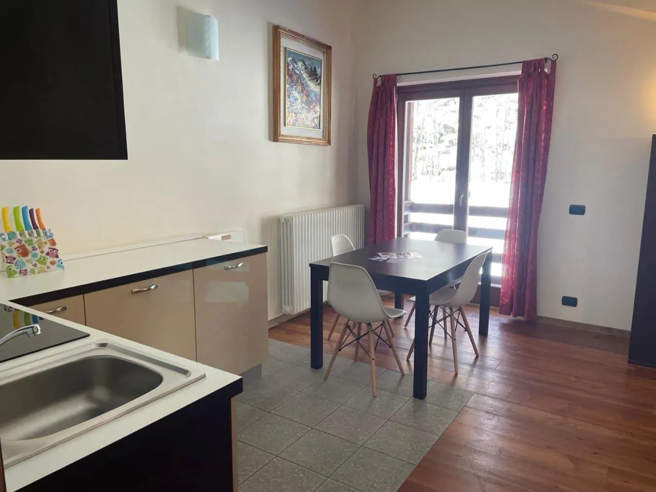 Kitchen or kitchenette in Residence Le Marmotte