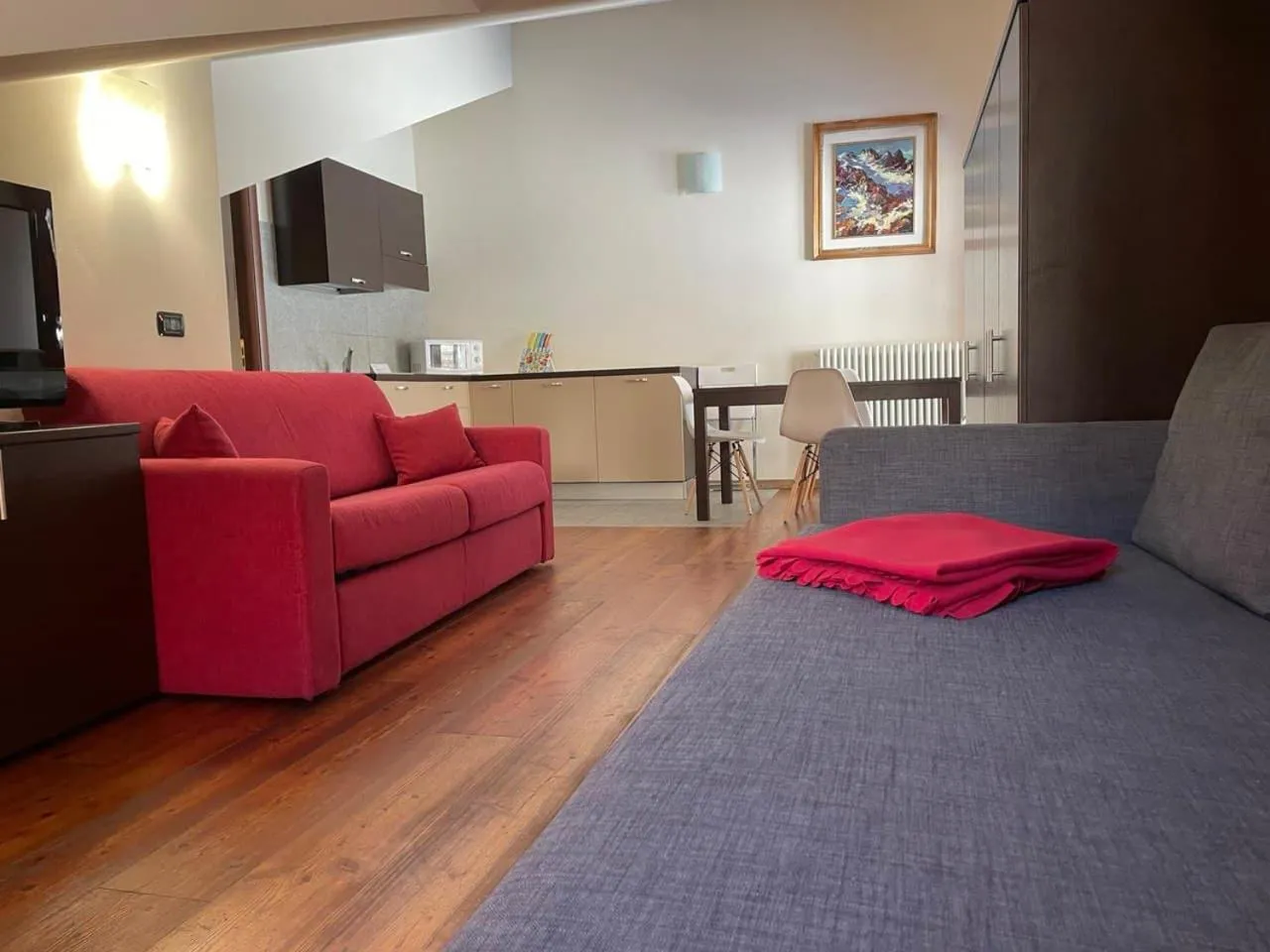 Living room, Bed in Residence Le Marmotte