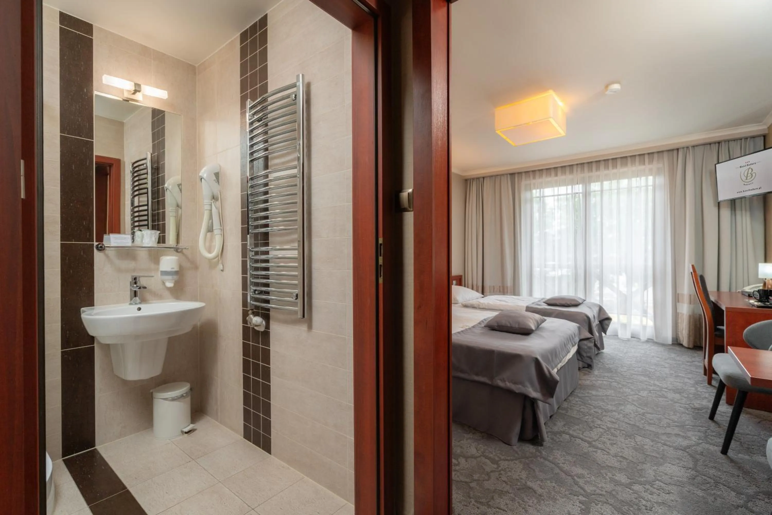 Toilet, Bed in Hotel Badura