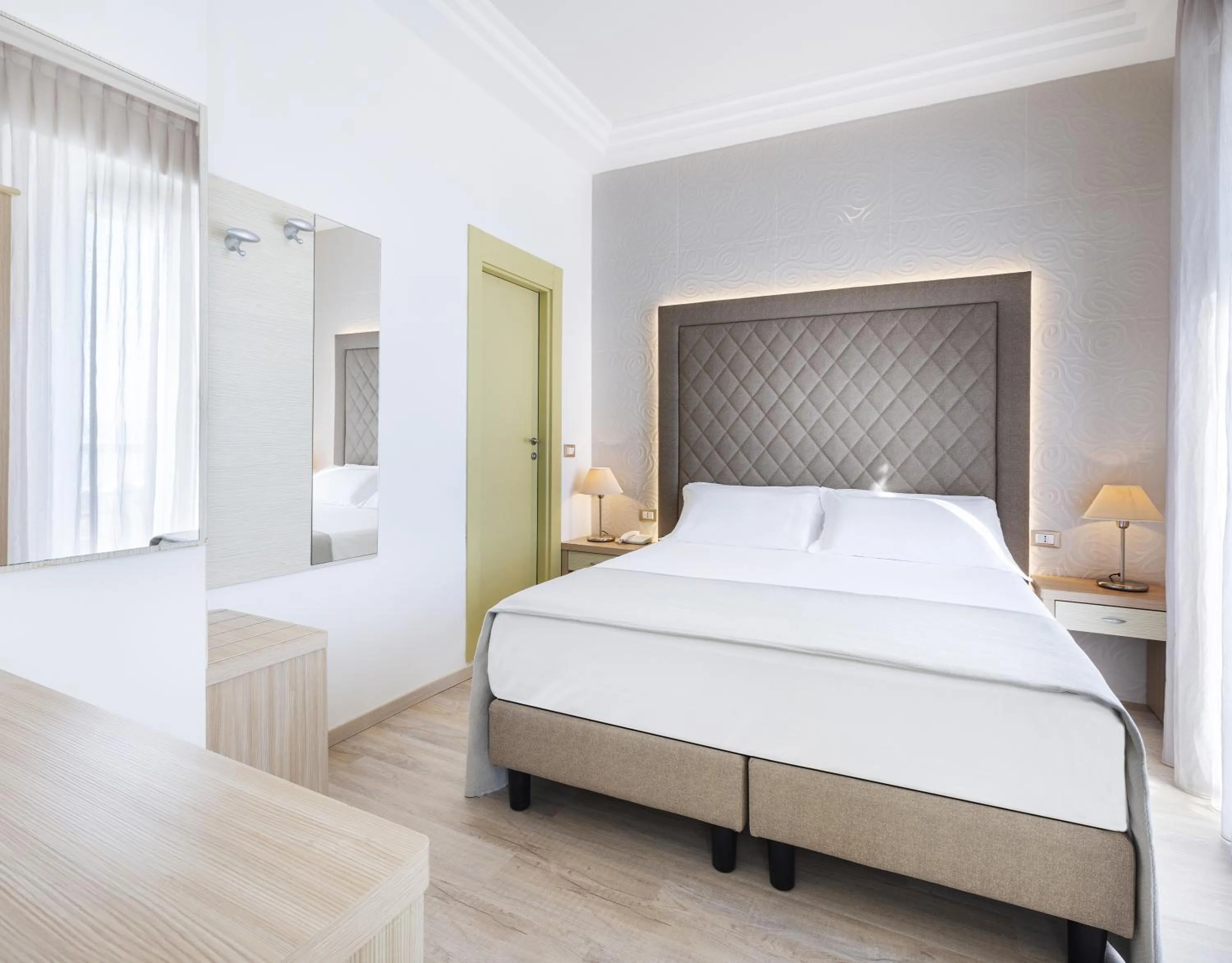 Bed in Hotel Riviera