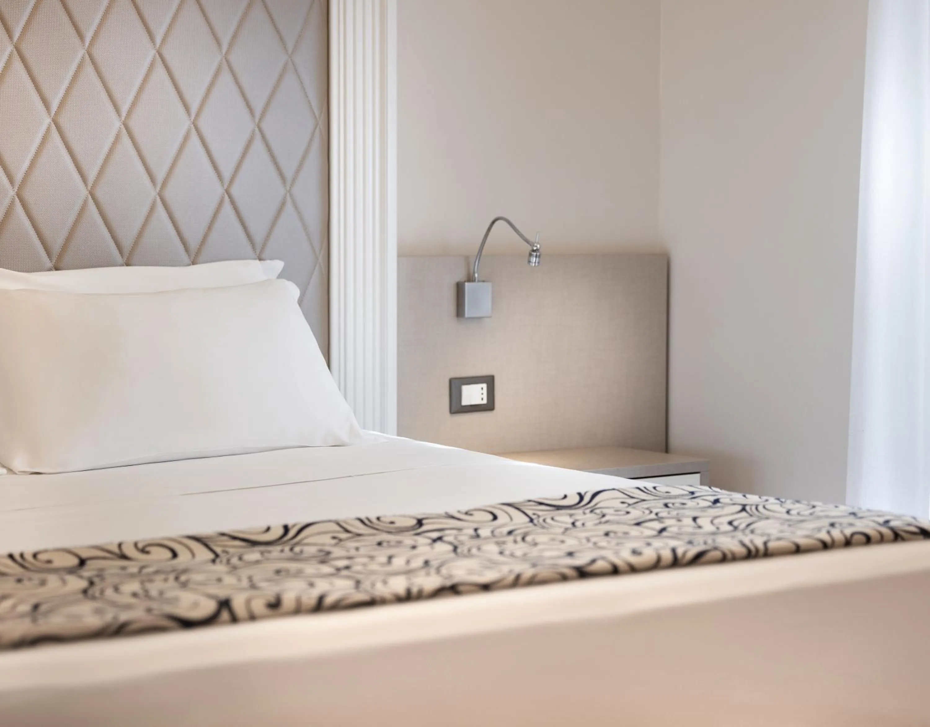 Bed in Hotel Riviera