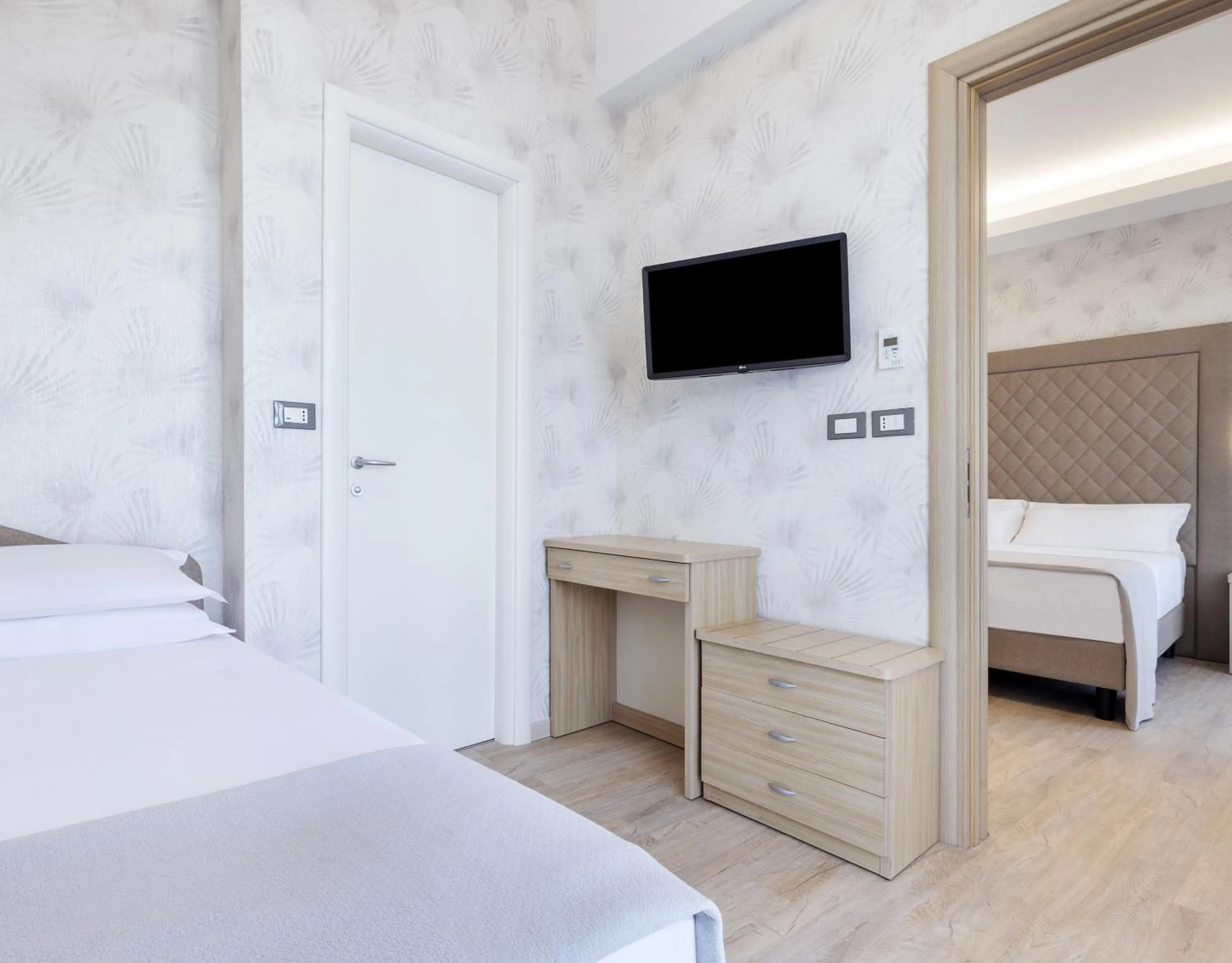 Bed in Hotel Riviera