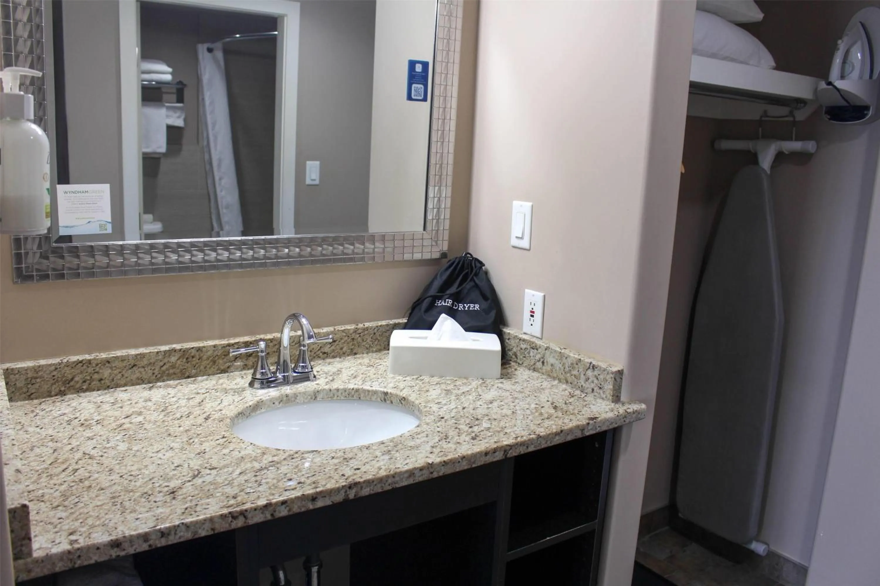 Bathroom in Ramada by Wyndham Sherwood Park